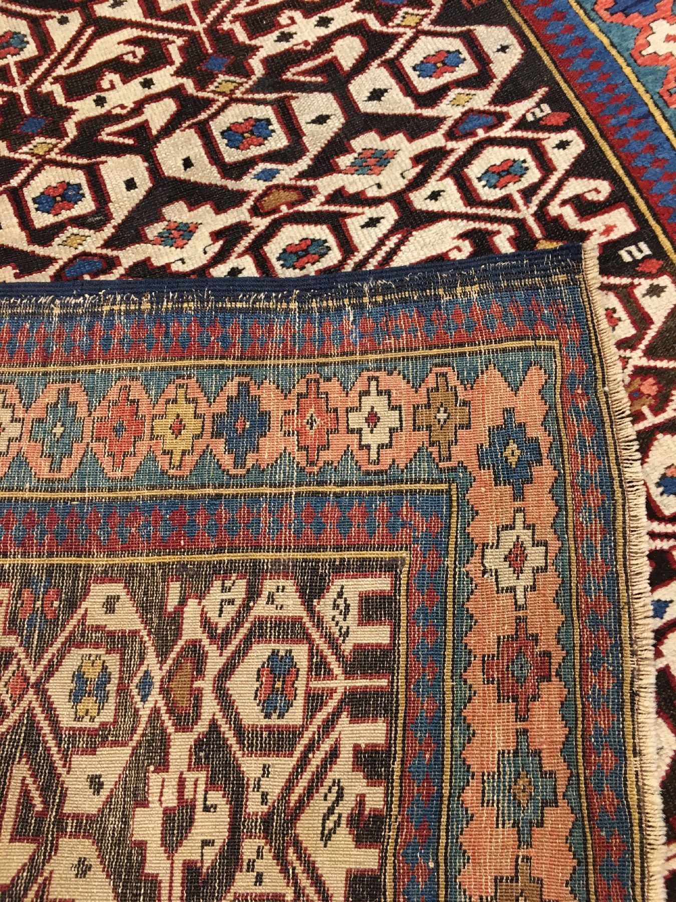 Detail h: Feiner Konagkend antik, Ostkaukasus Kuba-Gebiet, Ende 19.Jhd., Wolle geknüpft auf Wolle. Ein klassisches Konagkend-Gittermuster belegt kunstvoll ...