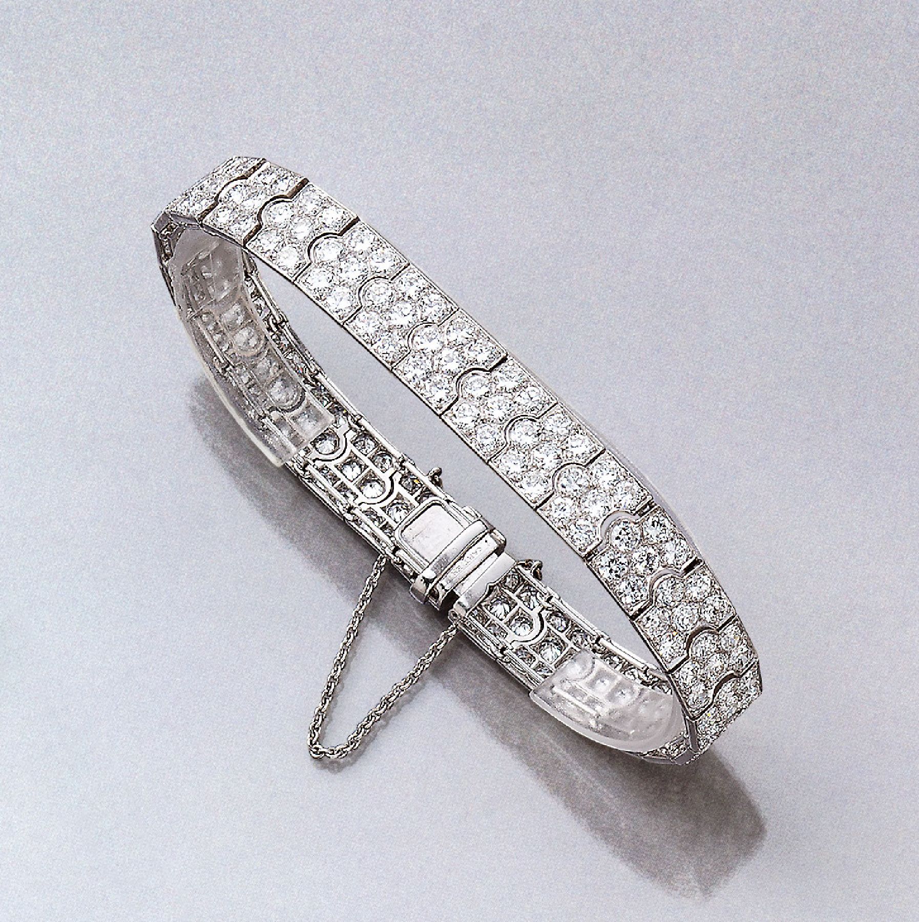 18 kt Gold CARTIER Armband mit Diamanten, WG 750/000, CARTIER Amerika 1950er Jahre, 28 Glieder bewegl. gearbeitet, bes. mit insges. 168 ...
