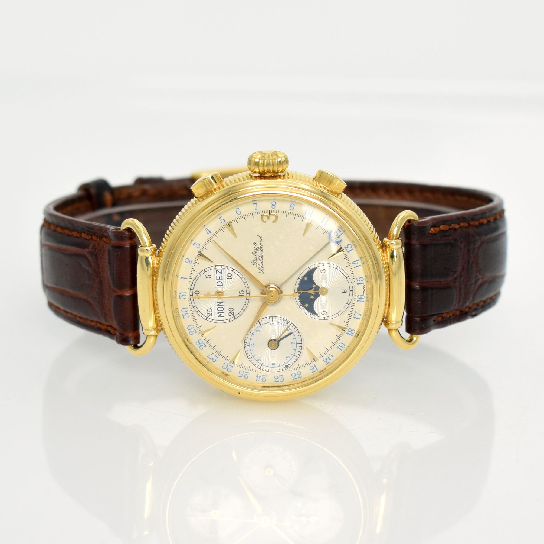 DUBEY & SCHALDENBRAND Armbandchronograph in GG 750/000 mit Vollkalenderanzeige inkl. Mondphase, Schweiz um 1990, 3-teil. Geh. beids. vergl., bewegl. ...
