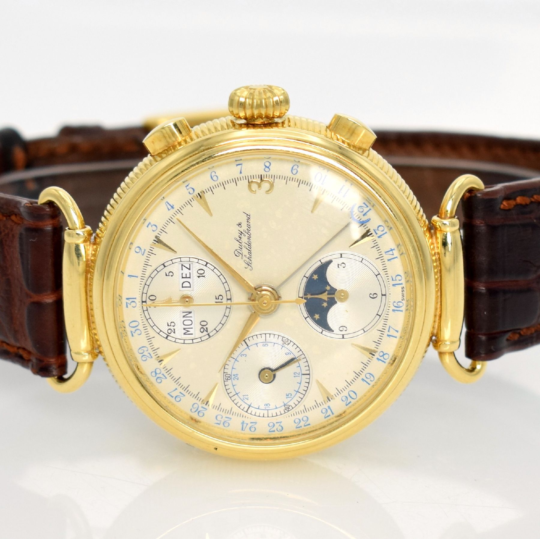 Detail a: DUBEY & SCHALDENBRAND Armbandchronograph in GG 750/000 mit Vollkalenderanzeige inkl. Mondphase, Schweiz um 1990, 3-teil. Geh. beids. vergl., bewegl. ...