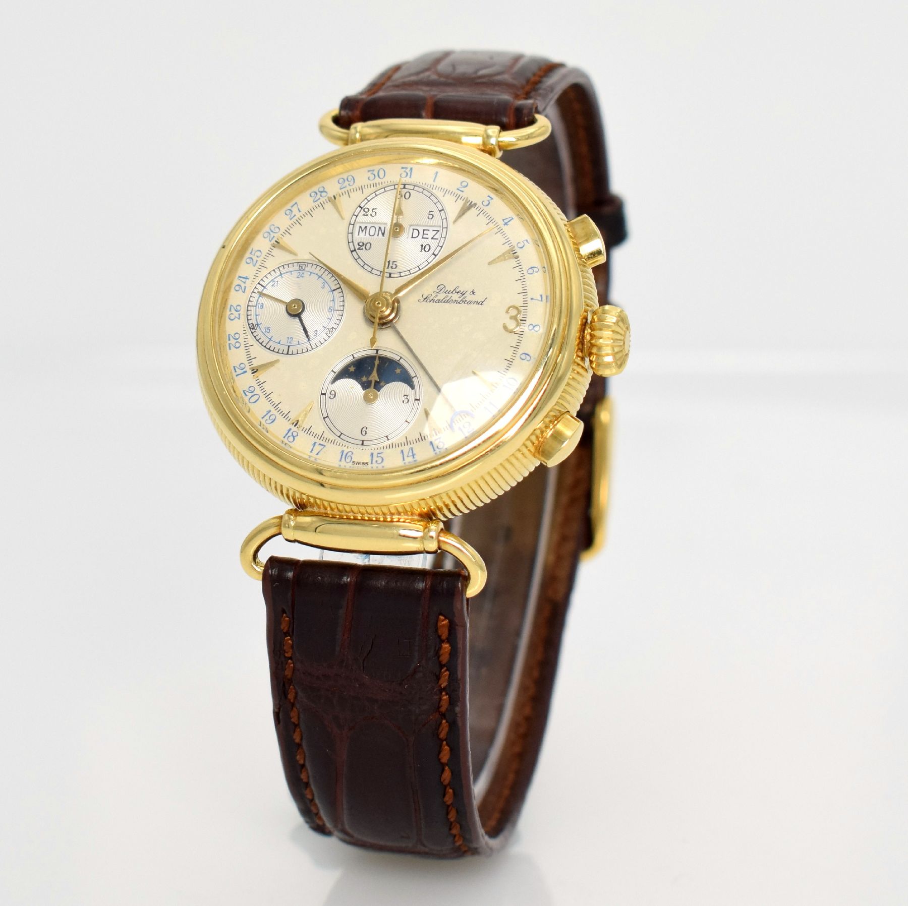 Detail b: DUBEY & SCHALDENBRAND Armbandchronograph in GG 750/000 mit Vollkalenderanzeige inkl. Mondphase, Schweiz um 1990, 3-teil. Geh. beids. vergl., bewegl. ...