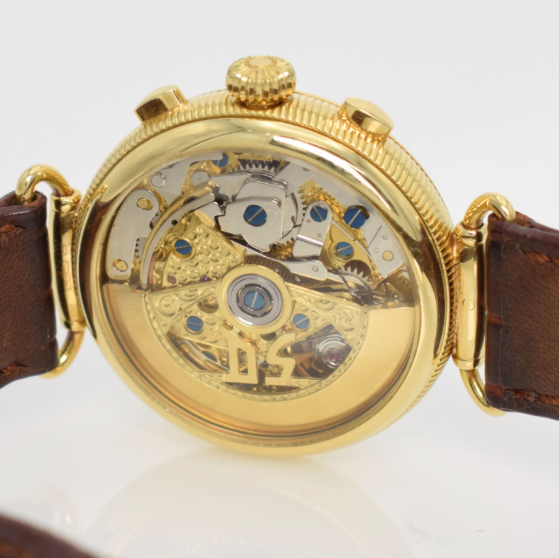 Detail e: DUBEY & SCHALDENBRAND Armbandchronograph in GG 750/000 mit Vollkalenderanzeige inkl. Mondphase, Schweiz um 1990, 3-teil. Geh. beids. vergl., bewegl. ...