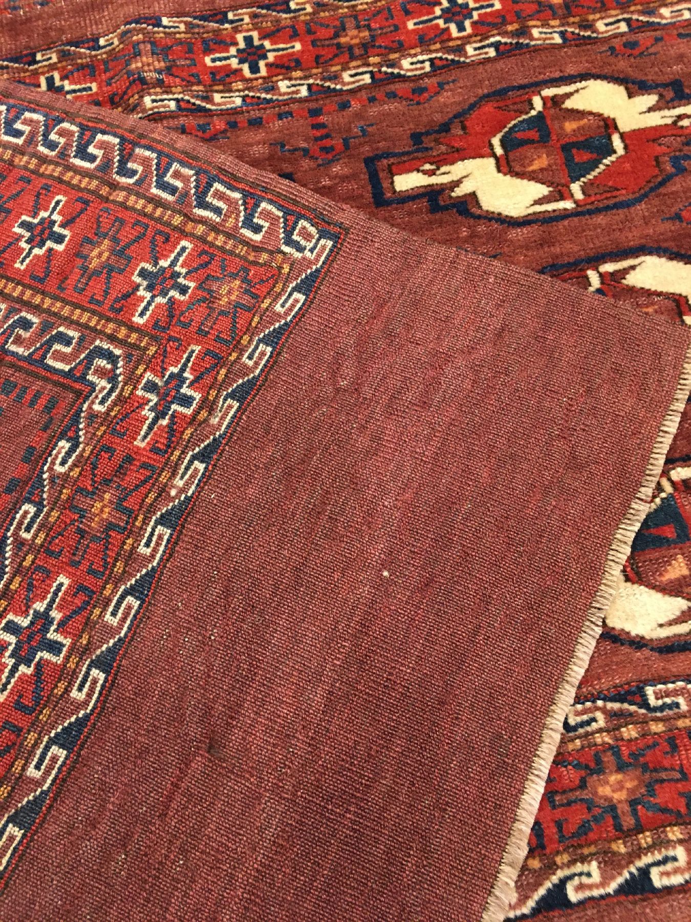 Detail h: Feiner Yomud "Tschowal" antik, Turkmenistan, 19.Jhd., Wolle geknüpft auf Wolle. Zelttasche der Yomuden mit seltenen Sekundärmotiven. ...