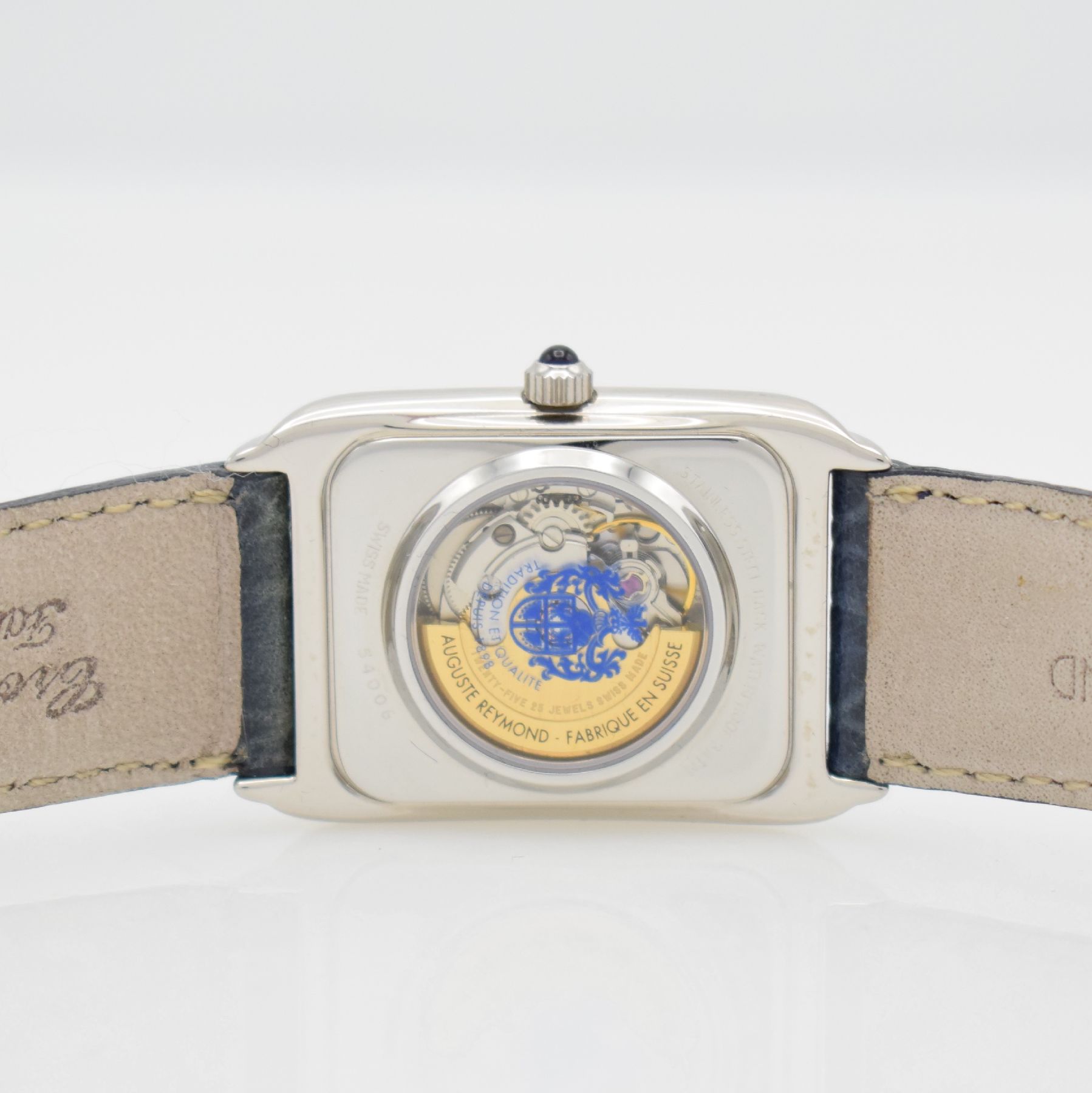 Detail e: AUGUSTE REYMOND rechteckige Armbanduhr, Schweiz um 2000, Automatik, beids. vergl. Metallgeh. m. Edelstahlboden gedr., orig. Lederband & Dornschl., ...