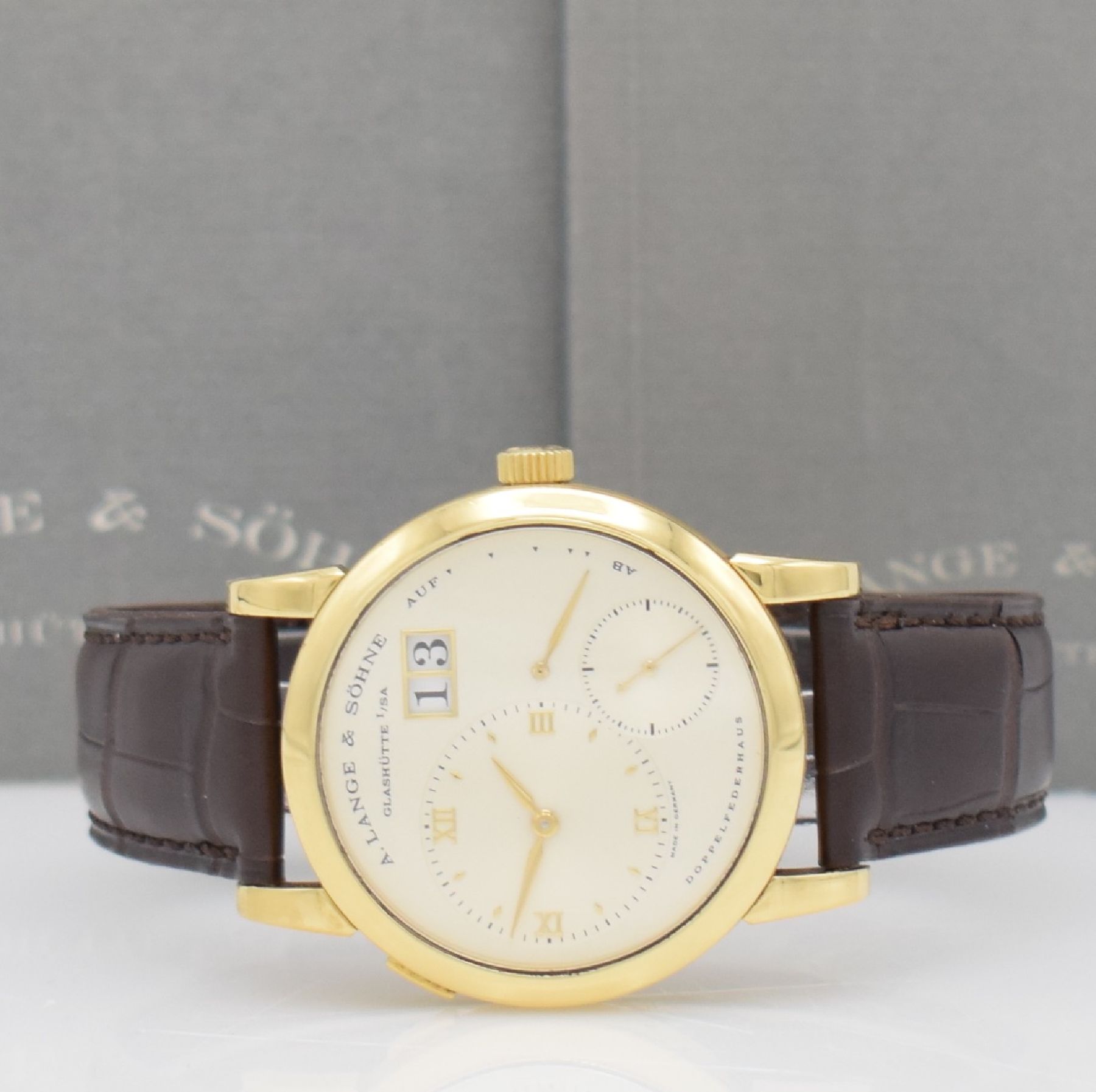Detail a: A. LANGE & SÖHNE seltene Lange 1 Herrenarmbanduhr in GG 750/000 mit Goldboden aus der ersten Serie, Handaufzug, Ref. 101.001, Boden 6-fach verschr., ...