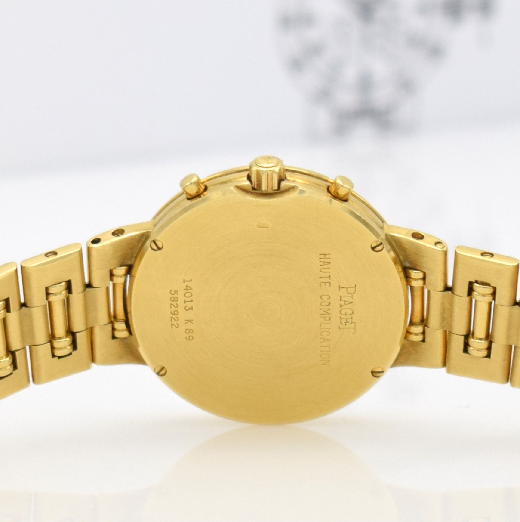 Detail g: PIAGET Dancer Complication Chronographe in GG 750/000, Schweiz um 2000, quarz, Ref. 14013 K 89, massives Goldgehäuse inkl. orig. Goldband, Boden ...