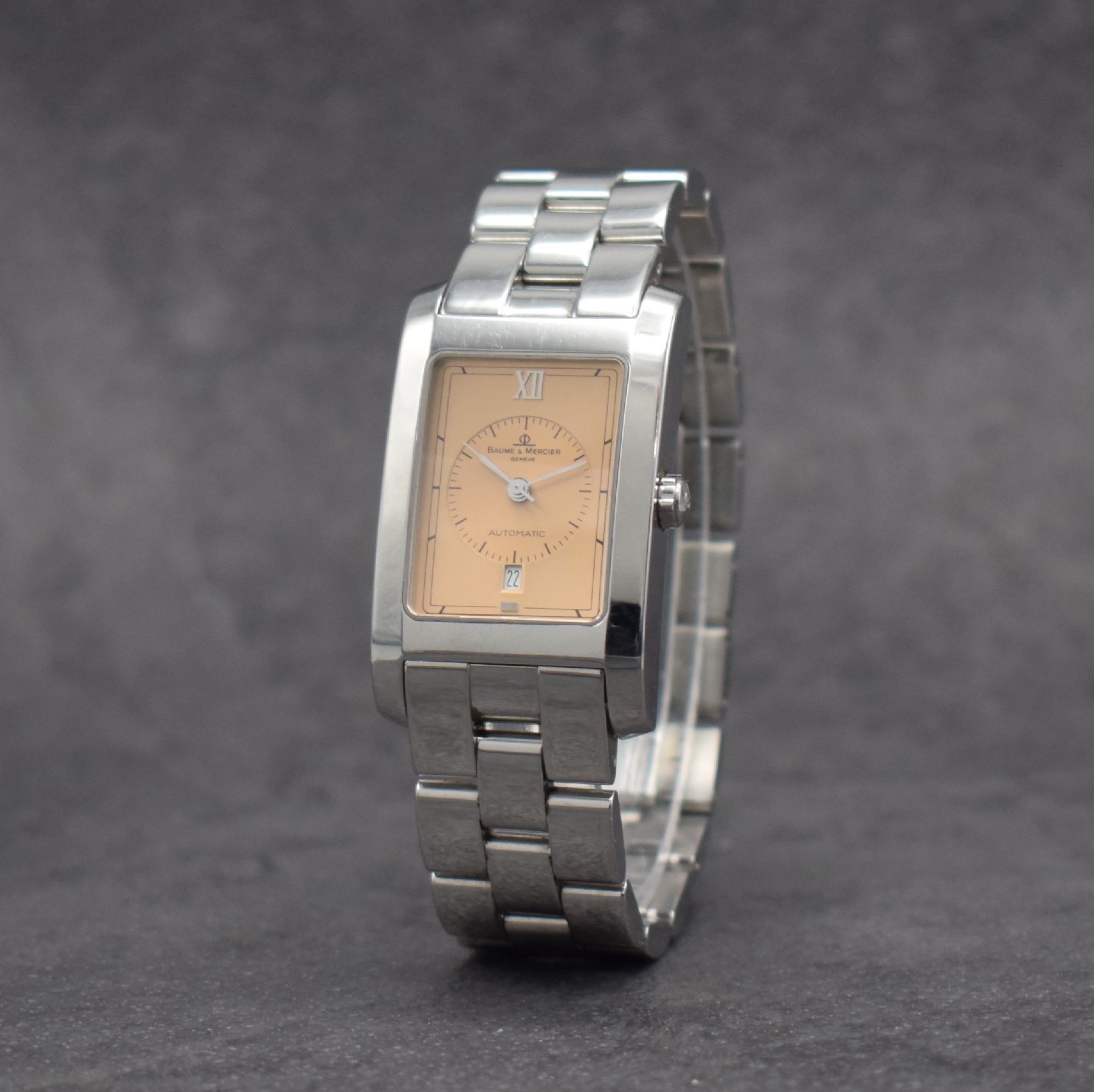 Detail b: BAUME MERCIER Hampton Armbanduhr in Edelstahl, Schweiz um 1996, Automatik, rechteckiges Geh., Boden aufgedr., Gliederband m. Faltschl., kupferfarb. ...