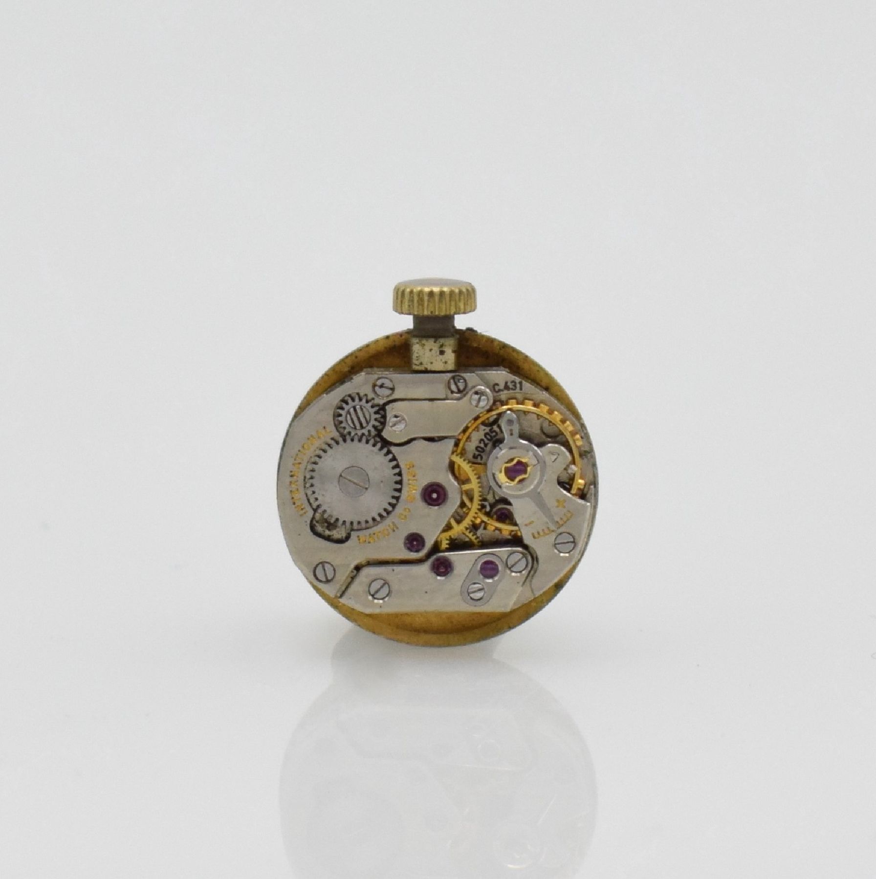 Detail e: IWC Damenarmbanduhr in GG 585/000, Schweiz um 1959, Handaufzug, Boden aufgedr., silb. Zifferbl. pat. m. aufgel. gold. Std.-Ind., gold. Zeiger, silb. ...