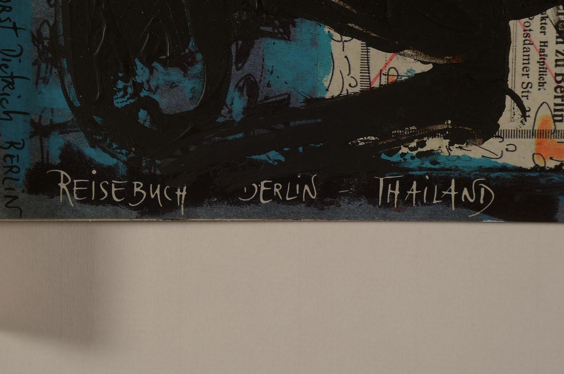 Detail a: Albrecht Genin, 1945-2013, Multiple, auf dem Umschlag übermaltes Heft (Reisebuch Berlin-Thailand), ca. 17x22cm, u.Gl., R. ca. 51x43cm