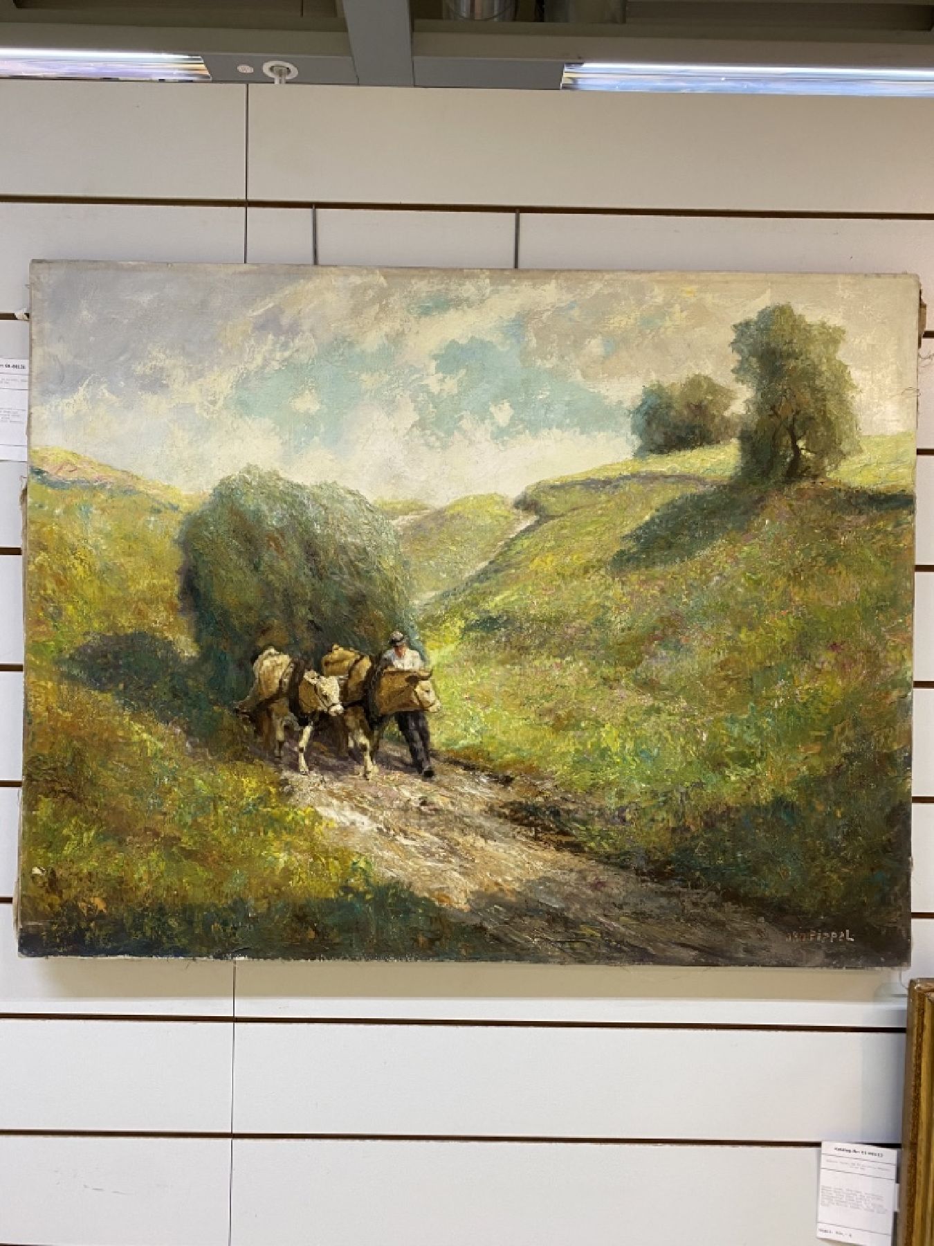 Detail c: Otto Pippel, 1878 Lodz-1960 Planegg, Bauer mit Heuwagen in hügeliger Landschaft, Öl/Lwd, rechts unten signiert, rückseitig altes Atelieretikett ...