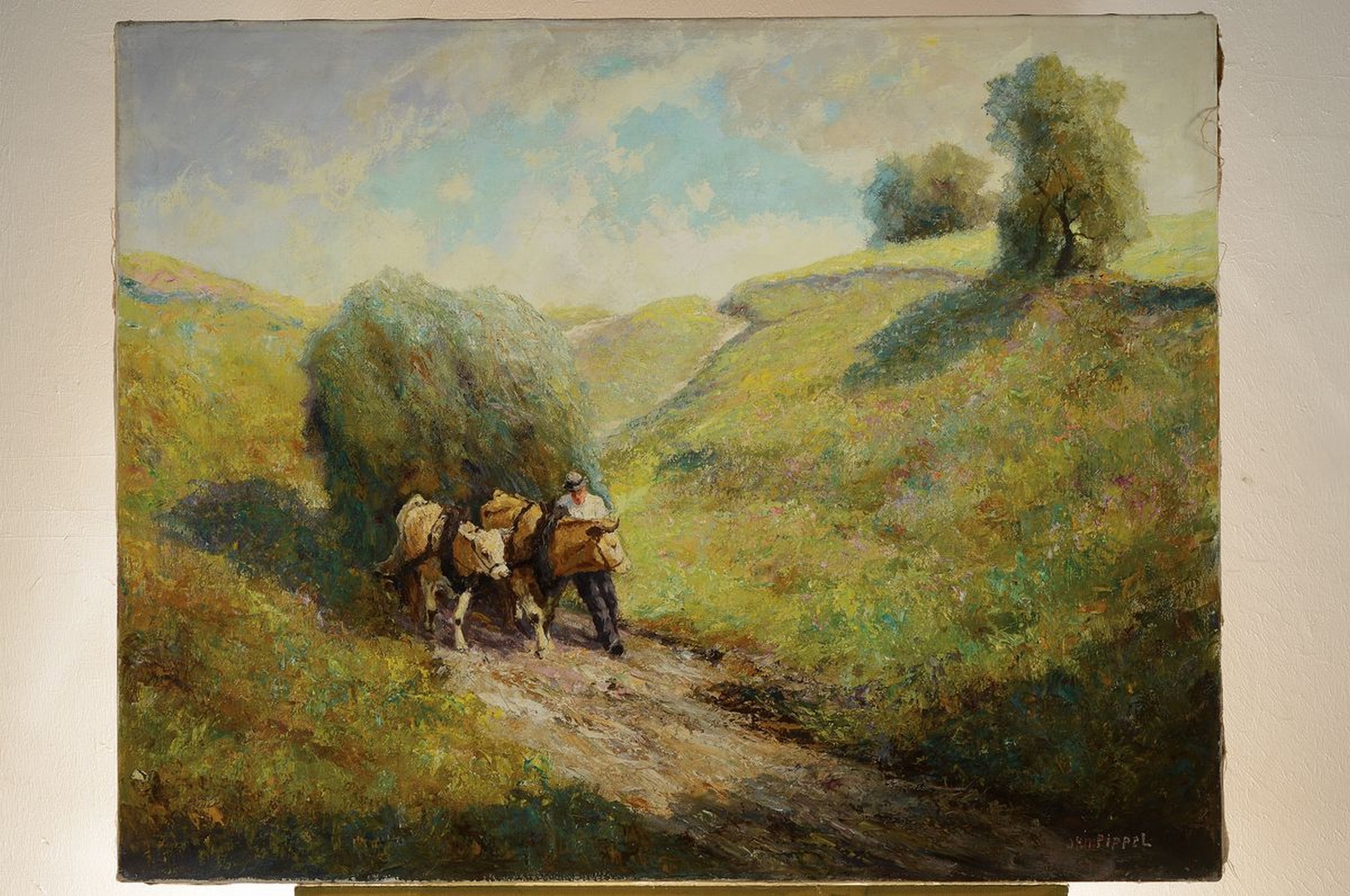 Detail k: Otto Pippel, 1878 Lodz-1960 Planegg, Bauer mit Heuwagen in hügeliger Landschaft, Öl/Lwd, rechts unten signiert, rückseitig altes Atelieretikett ...