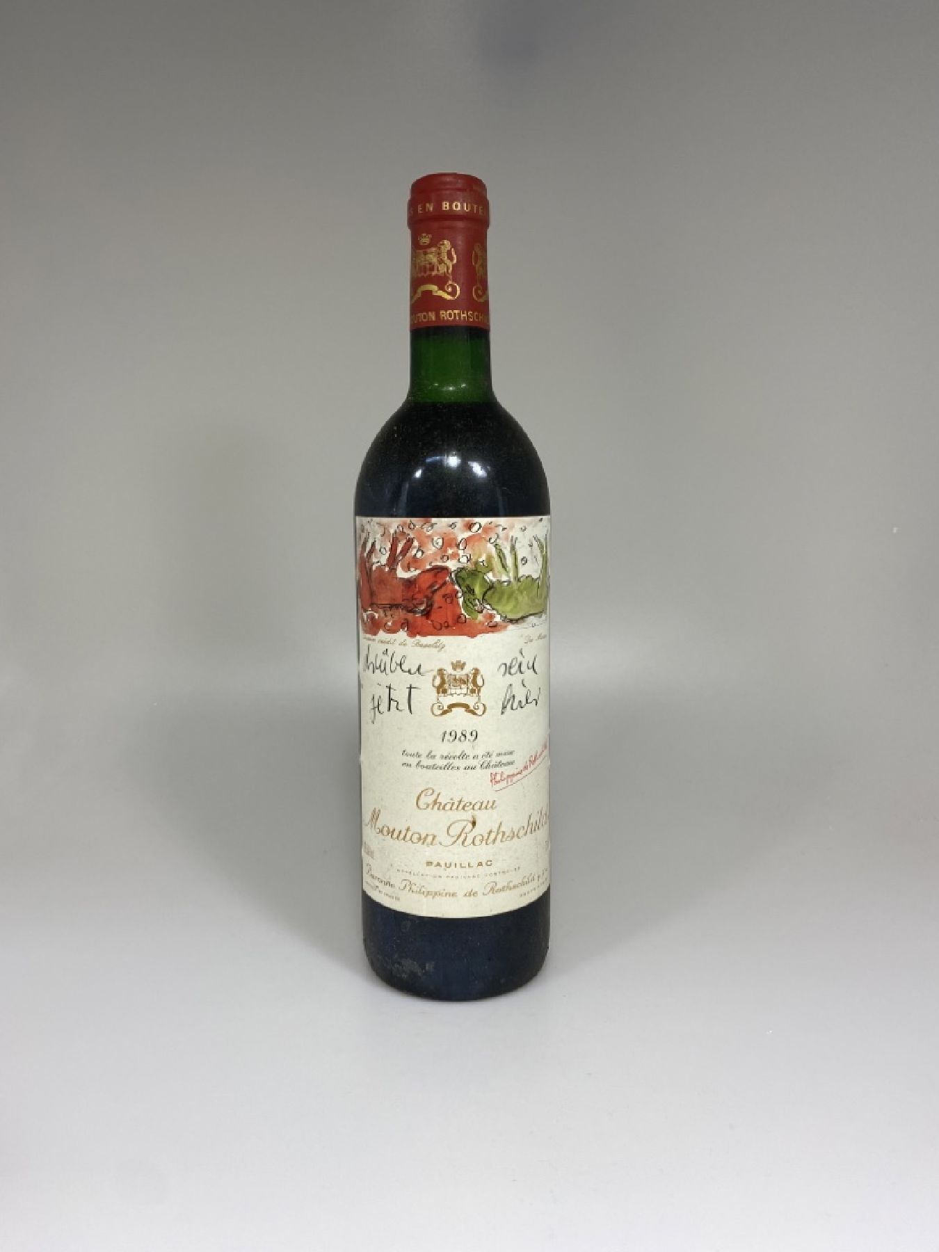 1 Fl. 1989 Chateau Mouton Rothschild, Pauillac, mid. shoulder, 75 cl, nicht verkostet