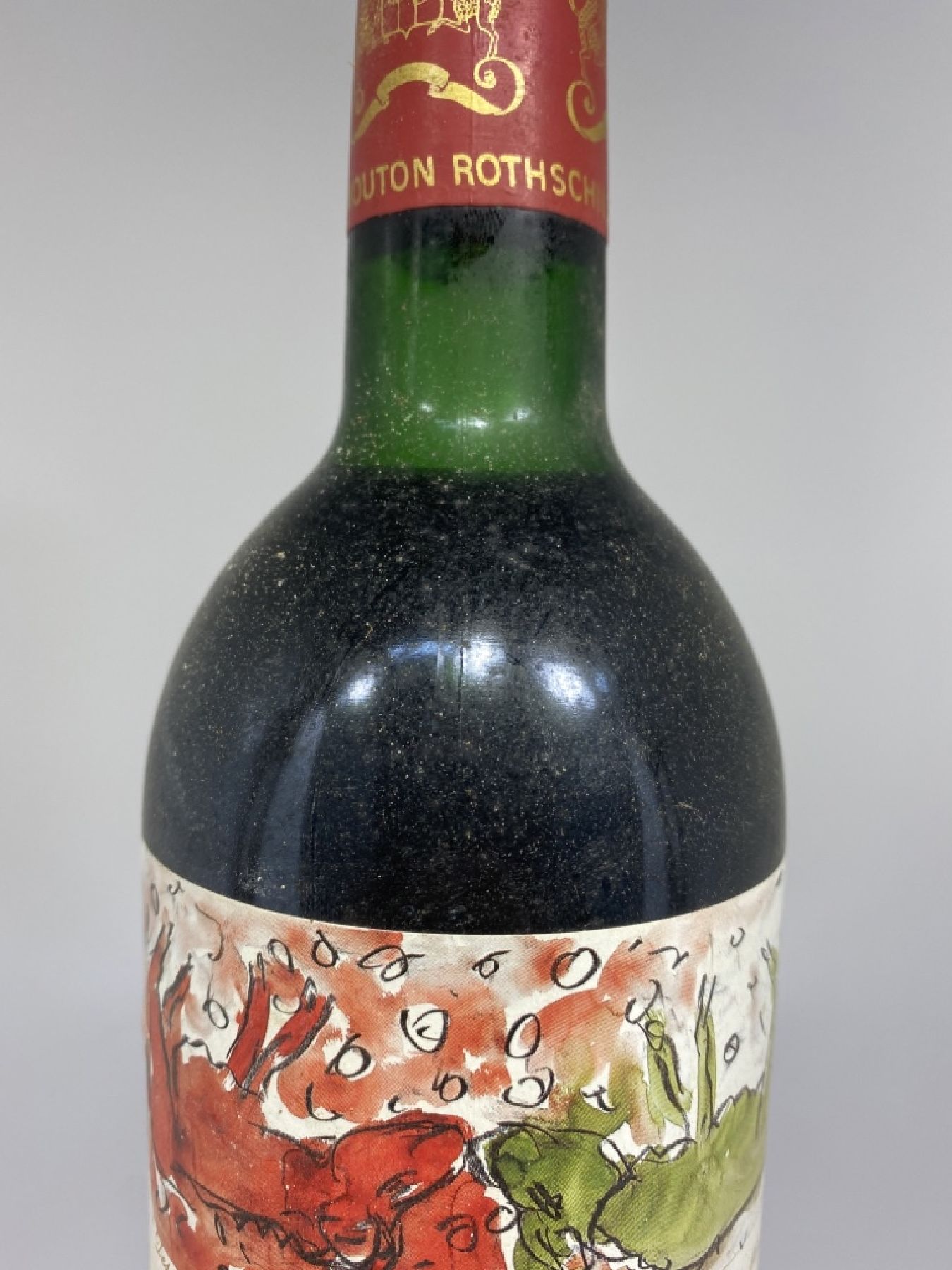 Detail c: 1 Fl. 1989 Chateau Mouton Rothschild, Pauillac, mid. shoulder, 75 cl, nicht verkostet