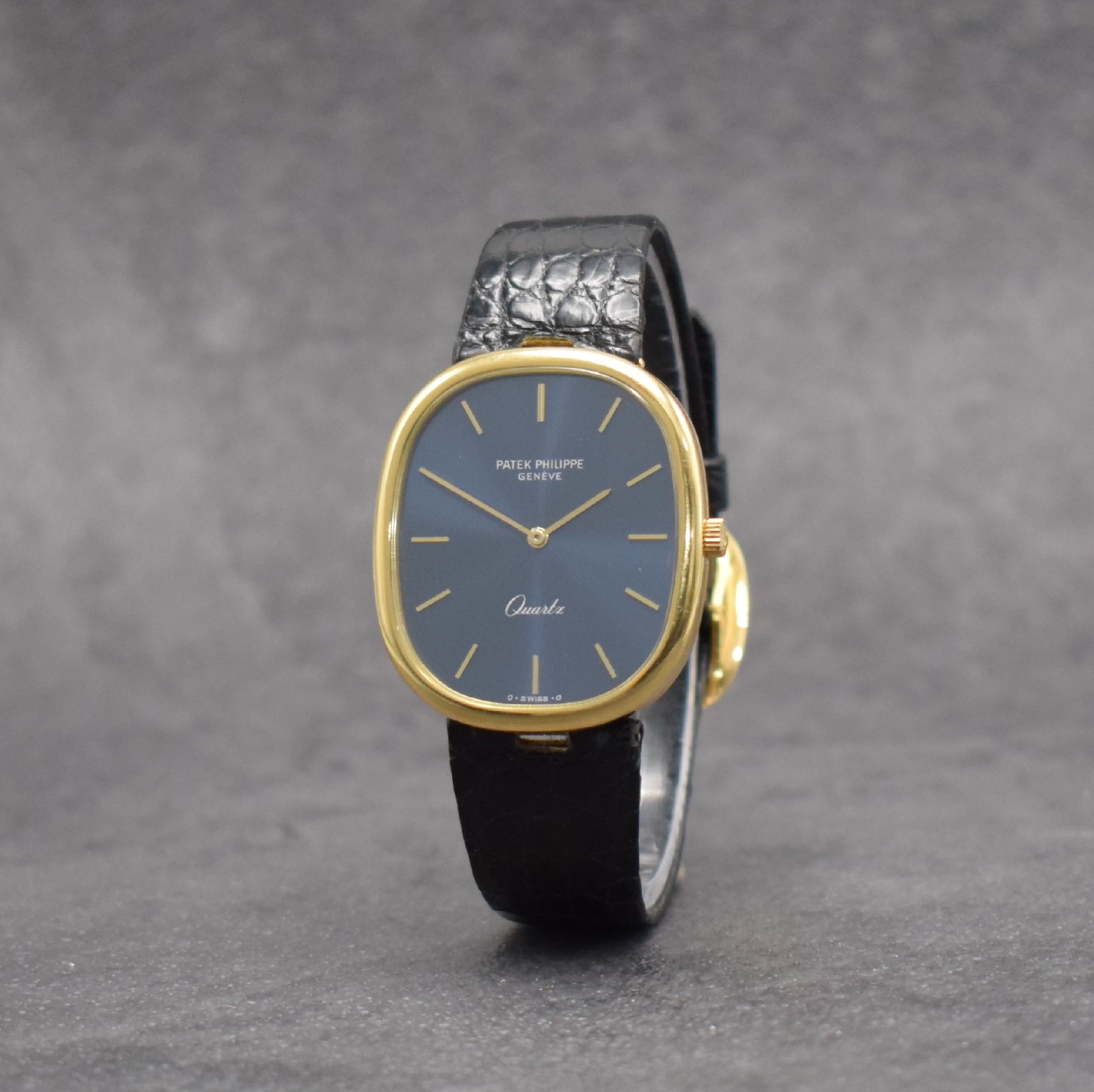 Detail b: PATEK PHILIPPE Ellipse d`Or Herrenarmbanduhr in GG 750/000 Referenz 3838, Schweiz um 1985, quarz, 2-teil. Gehäuse, Boden aufgedr., orig. Lederband ...