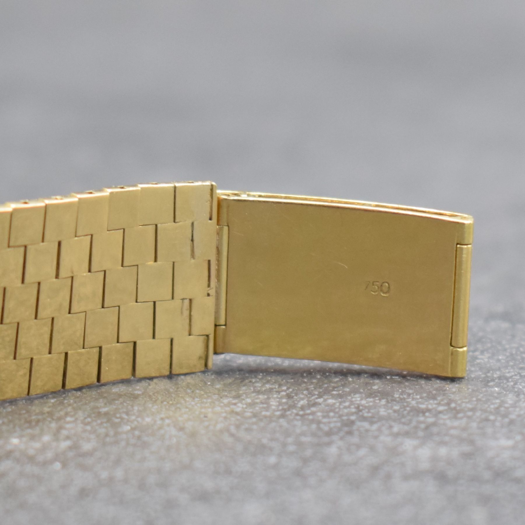 Detail e: ROLEX Armbanduhr in GG 750/000 Referenz 9878, Schweiz um 1962, Handaufzug, Boden verschr., orig. GG 750/000 Band, gold. Zifferbl. m. aufgel. gold. ...