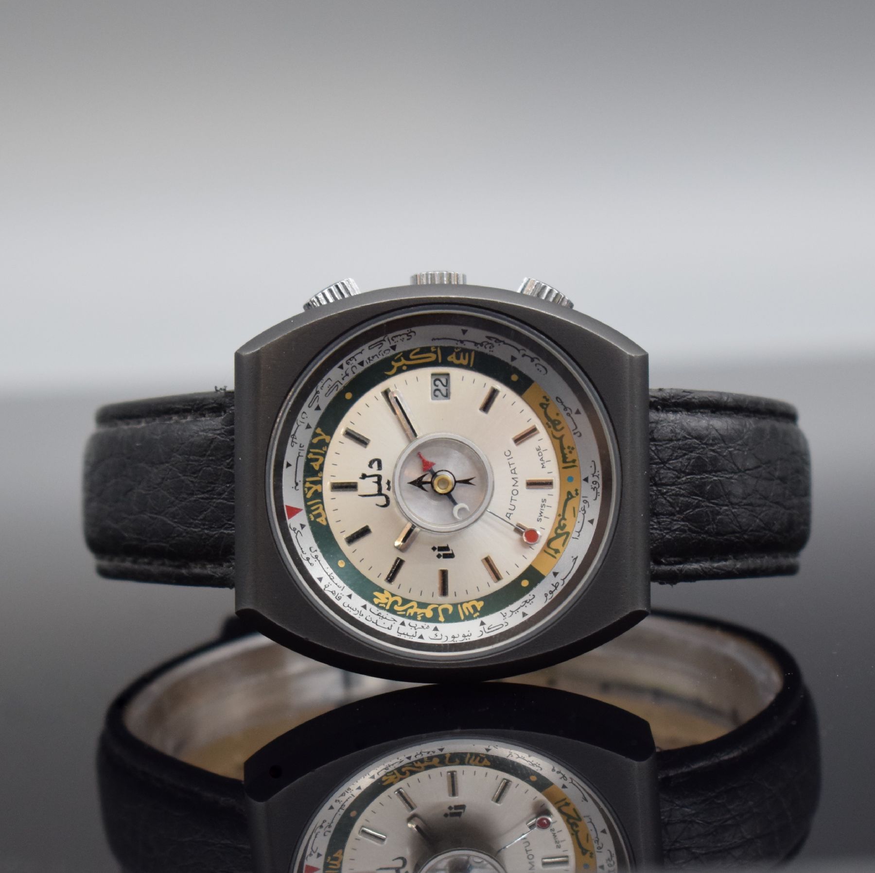 DALIL sog. Moslems-Watch gut erhaltene Herrenarmbanduhr mit Kompass, Schweiz um 1975, Automatik, geschwärztes Gehäuse, Edelstahlboden geschr., ...
