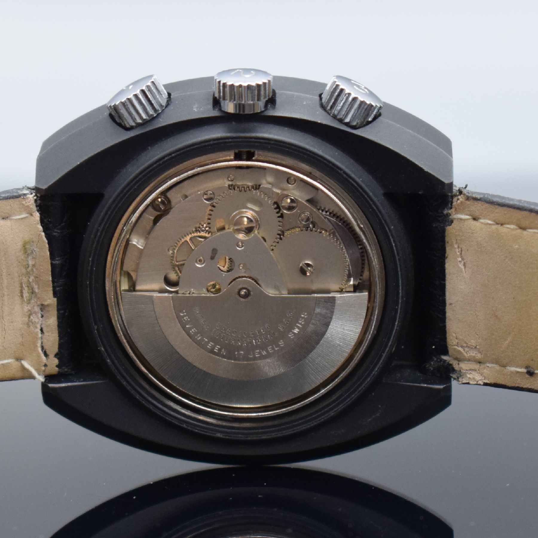 Detail f: DALIL sog. Moslems-Watch gut erhaltene Herrenarmbanduhr mit Kompass, Schweiz um 1975, Automatik, geschwärztes Gehäuse, Edelstahlboden geschr., ...