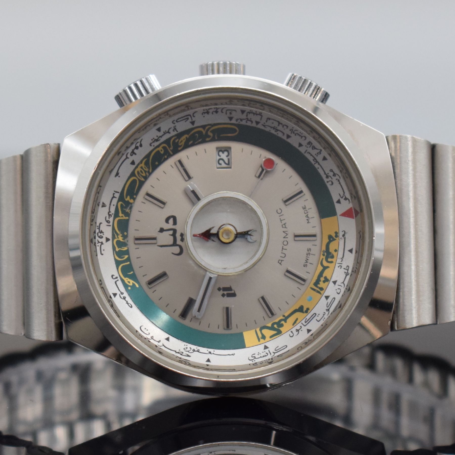 Detail a: DALIL sog. Moslems-Watch gut erhaltene Herrenarmbanduhr mit Kompass, Schweiz um 1975, Automatik, verchr. Gehäuse inkl. Stahl- Band m. Faltschl., ...