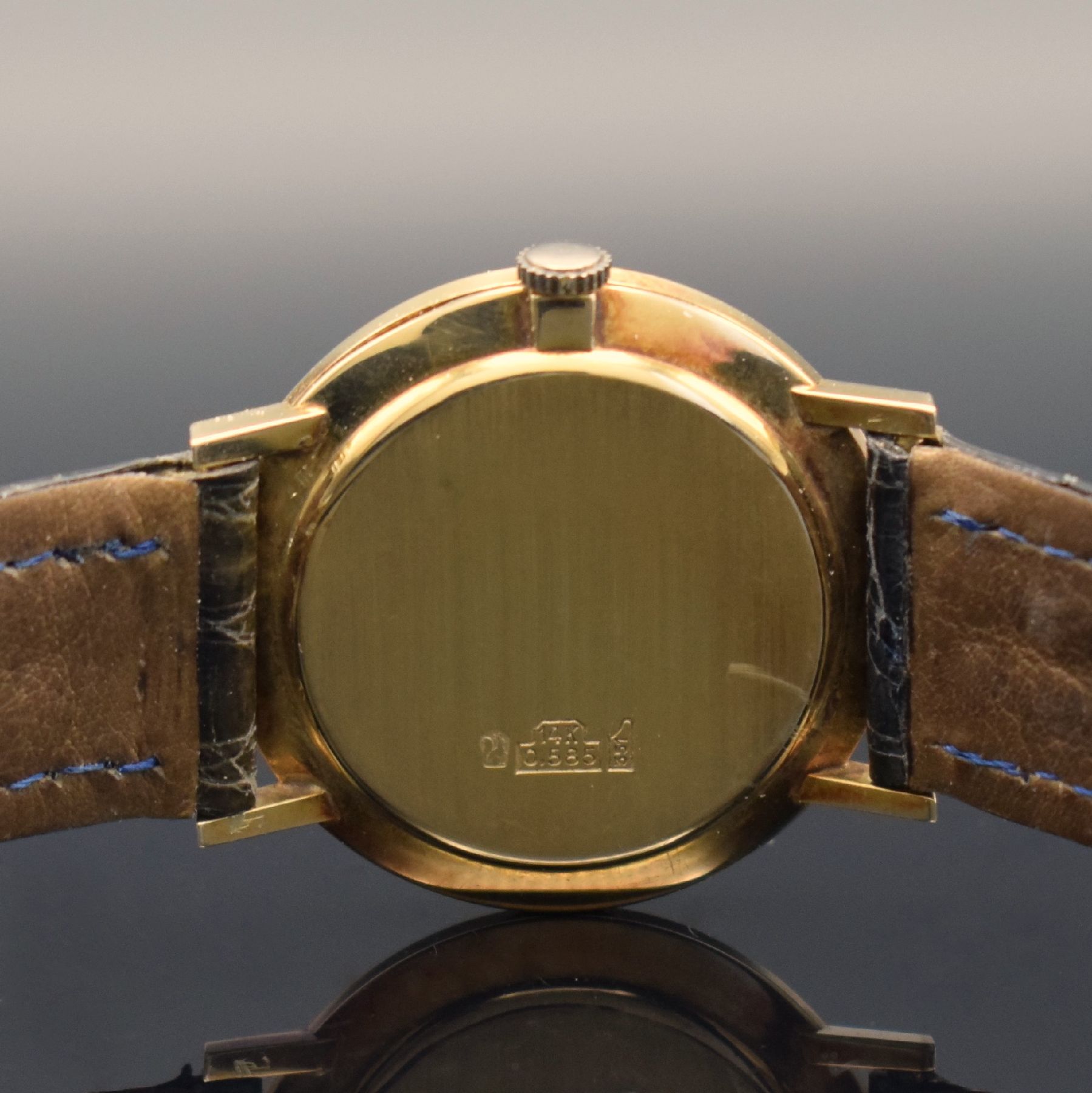 Detail d: CICONIA Herrenarmbanduhr in GG 585/000, Schweiz um 1970, Handaufzug, 2-teil. Gehäuse, Boden aufgedr., silb. Zifferbl. m. aufges. Std.-Ind., gold. ...