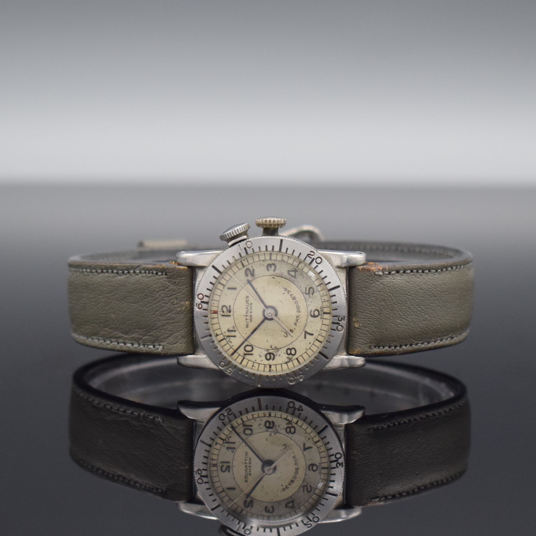 WITTNAUER WEEMS seltene Armbanduhr, Schweiz für den US-Markt um 1935, Handaufzug, verchr. Gehäuse, Boden aufgedr., Lünette mit 60er Teilung ...