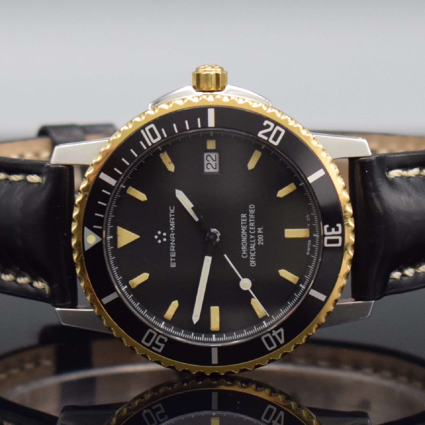 Detail a: ETERNA-MATIC Chronometer Herrenarmbanduhr, Schweiz um 1990, Automatik, Edelstahl/ Gold komb., eins. drehb. Lünette, geschr. Boden m. Widmung, ...