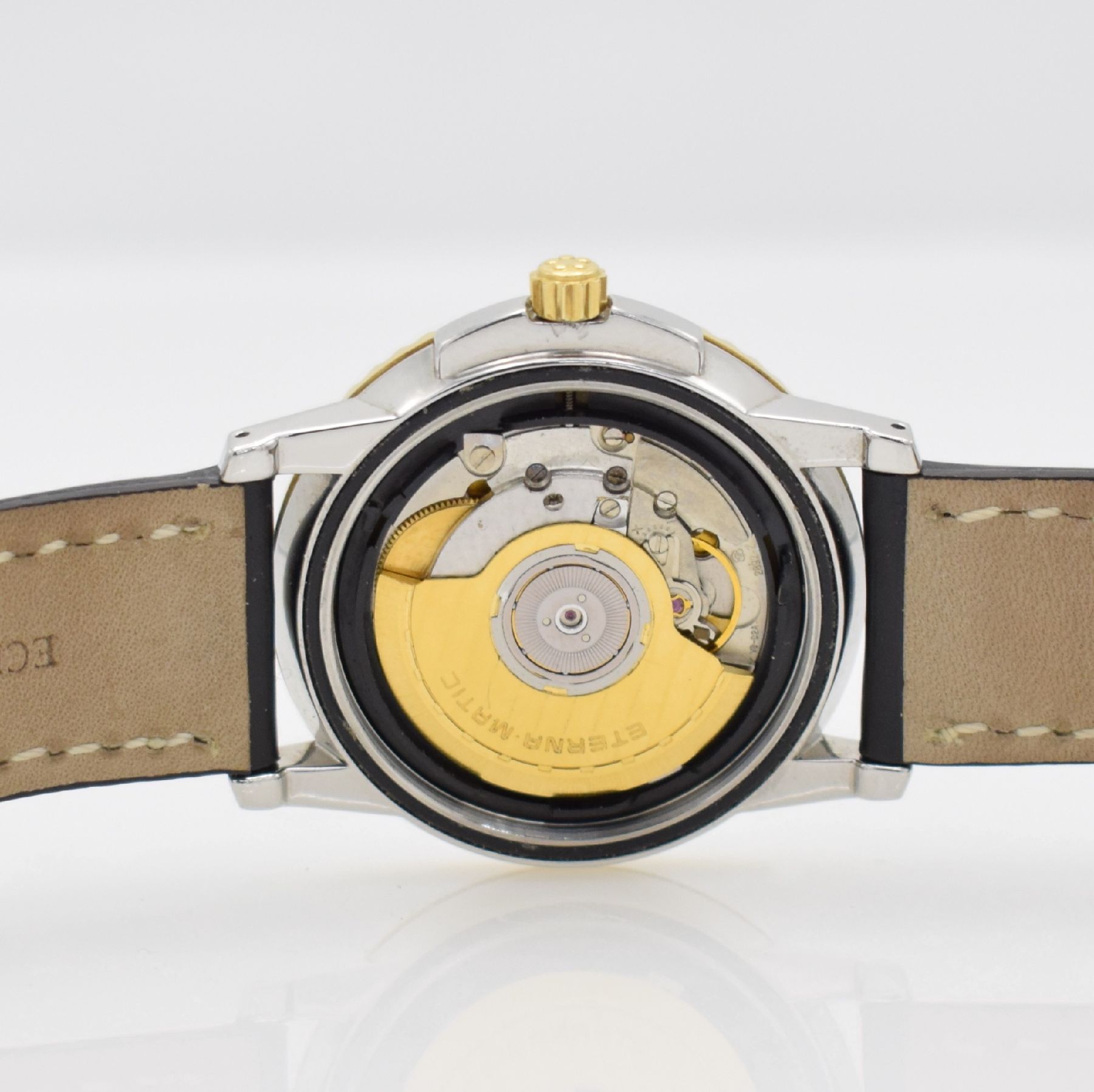 Detail f: ETERNA-MATIC Chronometer Herrenarmbanduhr, Schweiz um 1990, Automatik, Edelstahl/ Gold komb., eins. drehb. Lünette, geschr. Boden m. Widmung, ...