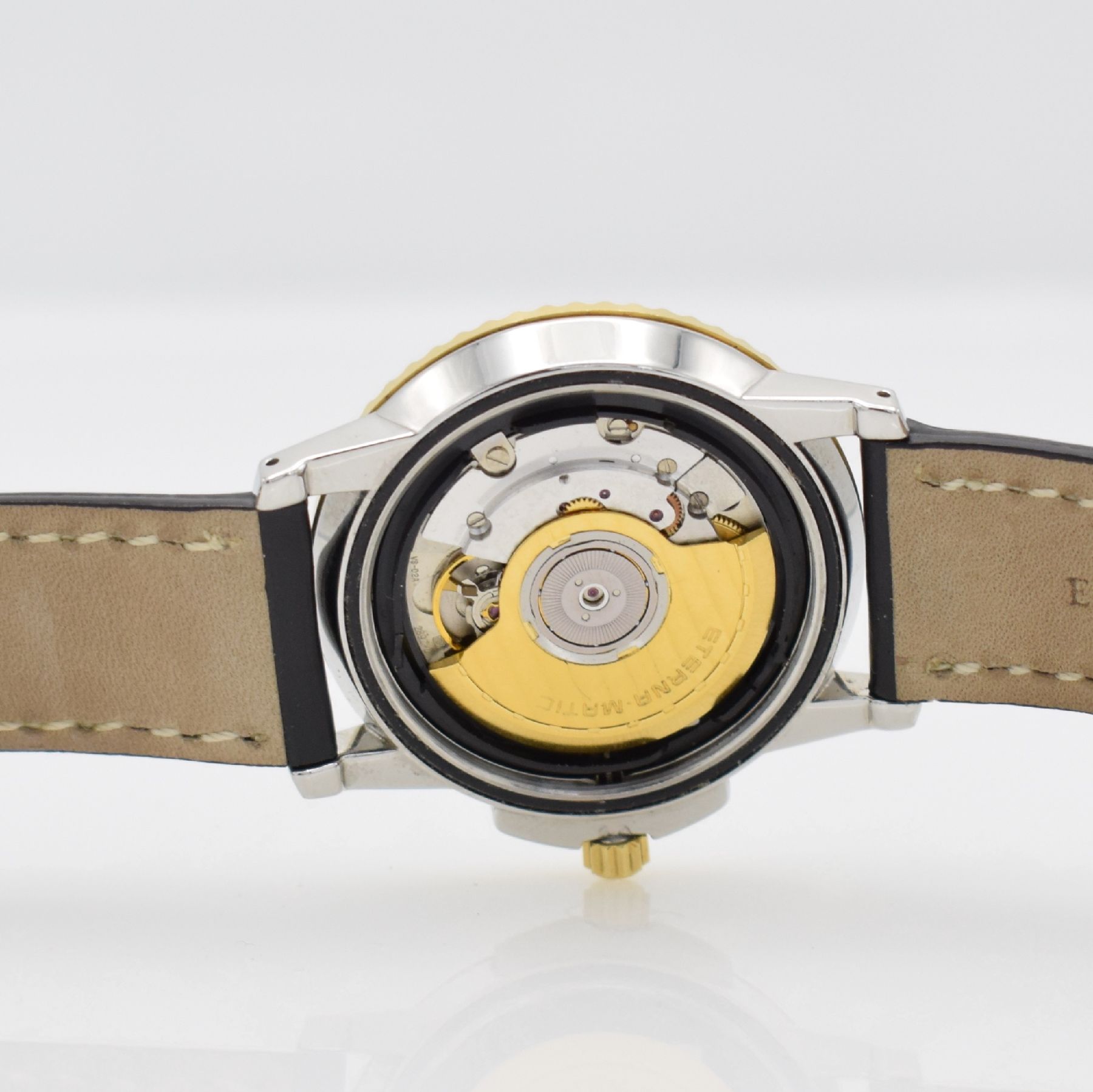 Detail g: ETERNA-MATIC Chronometer Herrenarmbanduhr, Schweiz um 1990, Automatik, Edelstahl/ Gold komb., eins. drehb. Lünette, geschr. Boden m. Widmung, ...