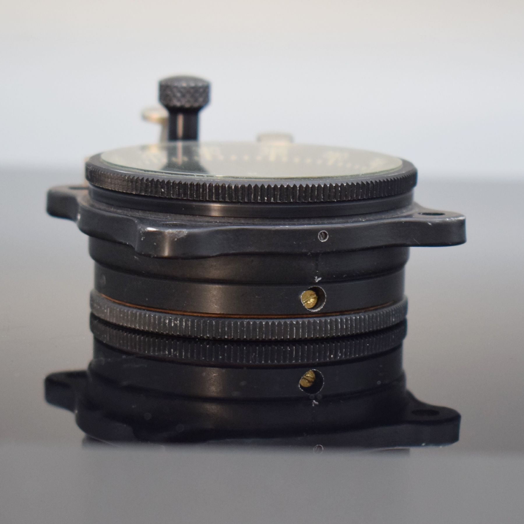 Detail e: MATHEY-TISSOT TYPE 12 seltene Borduhr mit Flyback-Chronograph Kal. Valjoux 555, Schweiz um 1960, geschwärztes Metallgehäuse, Boden m. ...