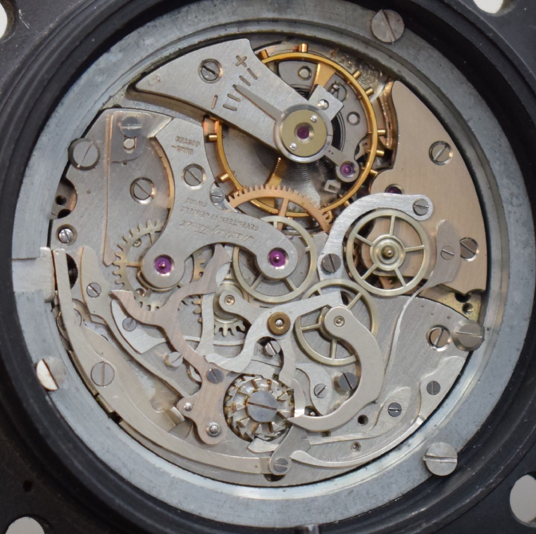 Detail k: MATHEY-TISSOT TYPE 12 seltene Borduhr mit Flyback-Chronograph Kal. Valjoux 555, Schweiz um 1960, geschwärztes Metallgehäuse, Boden m. ...