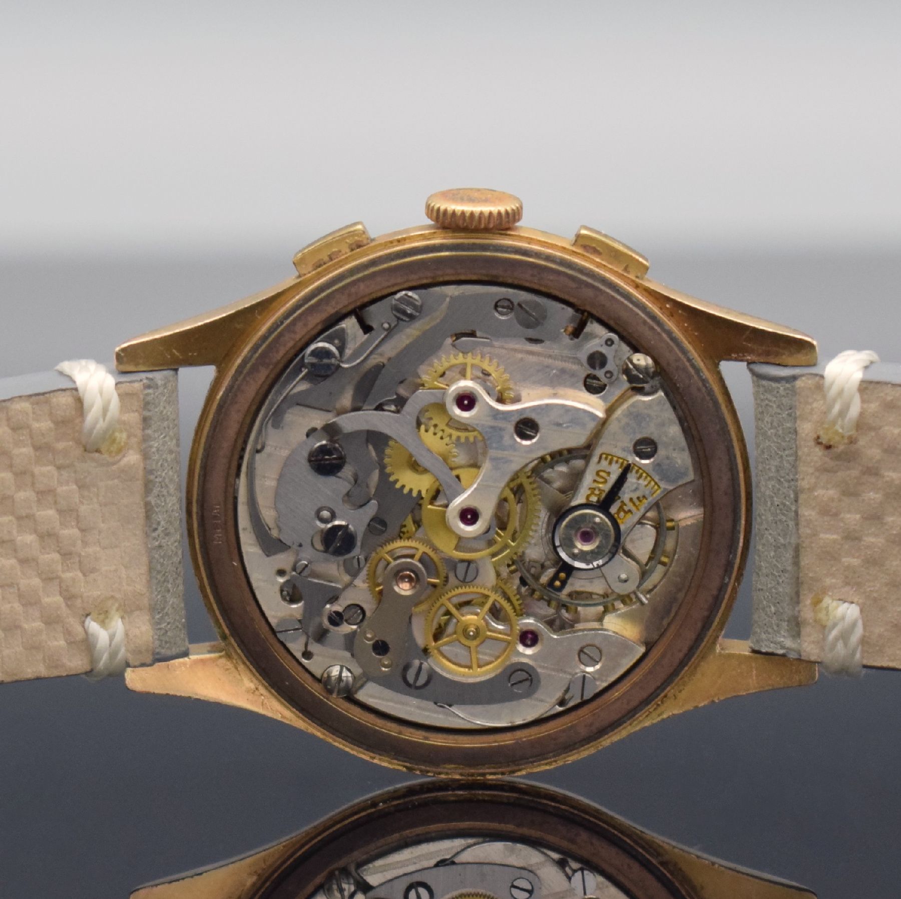 Detail f: CHRONOGRAPHE SUISSE Herrenarmbanduhr mit Chronograph in RG 750/000, Schweiz um 1950, Handaufzug, Geh. l. dell., Boden, Glasrand & Cuvette aufgedr., ...