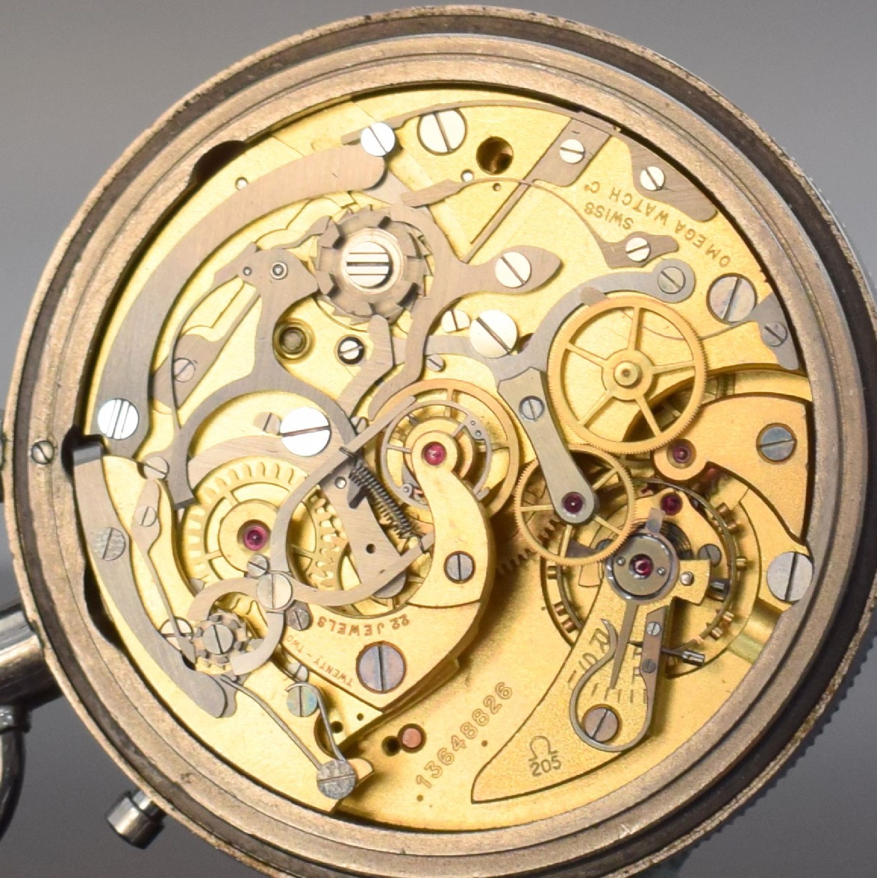 Detail k: OMEGA seltener Olympia Chronograph Rattrapante Kal. 205 mit Observatoriums-Zertifikat, Schweiz um 1956, poliertes Stahlgehäuse Ref. CK 1155, Boden & ...
