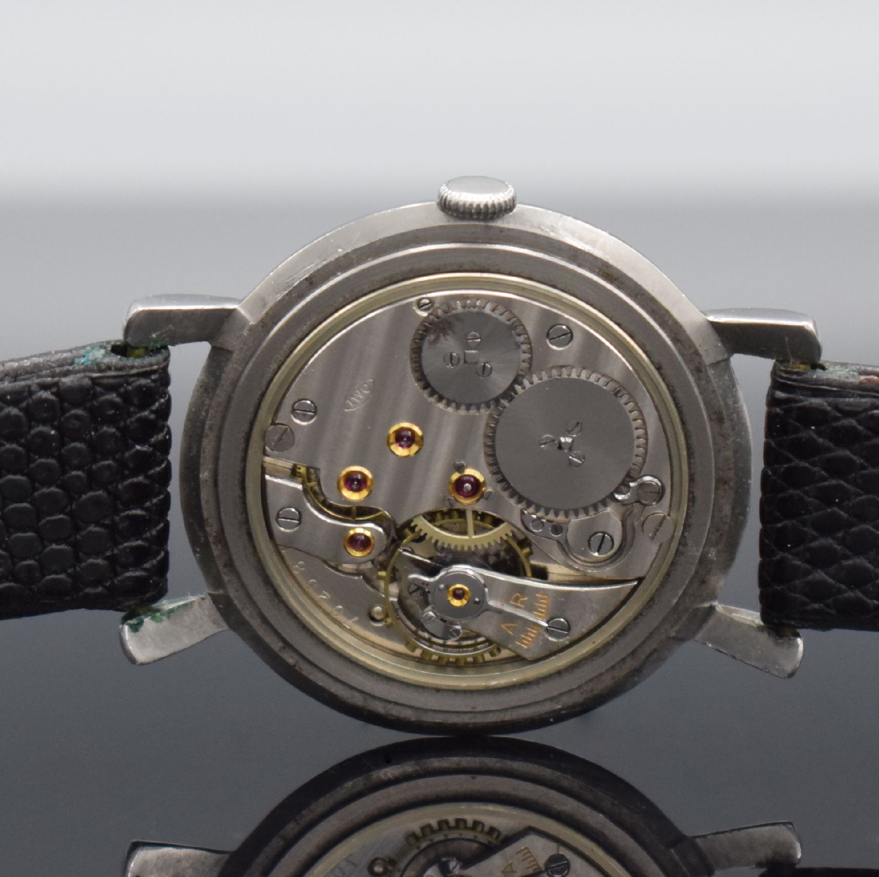 IWC Kaliber 64T seltenes Werk im späteren IWC Stahlgehäuse, Schweiz um 1920/1950, Handaufzug, 3-tlg. Geh., Boden & Glasrand aufgedr., silb. ...