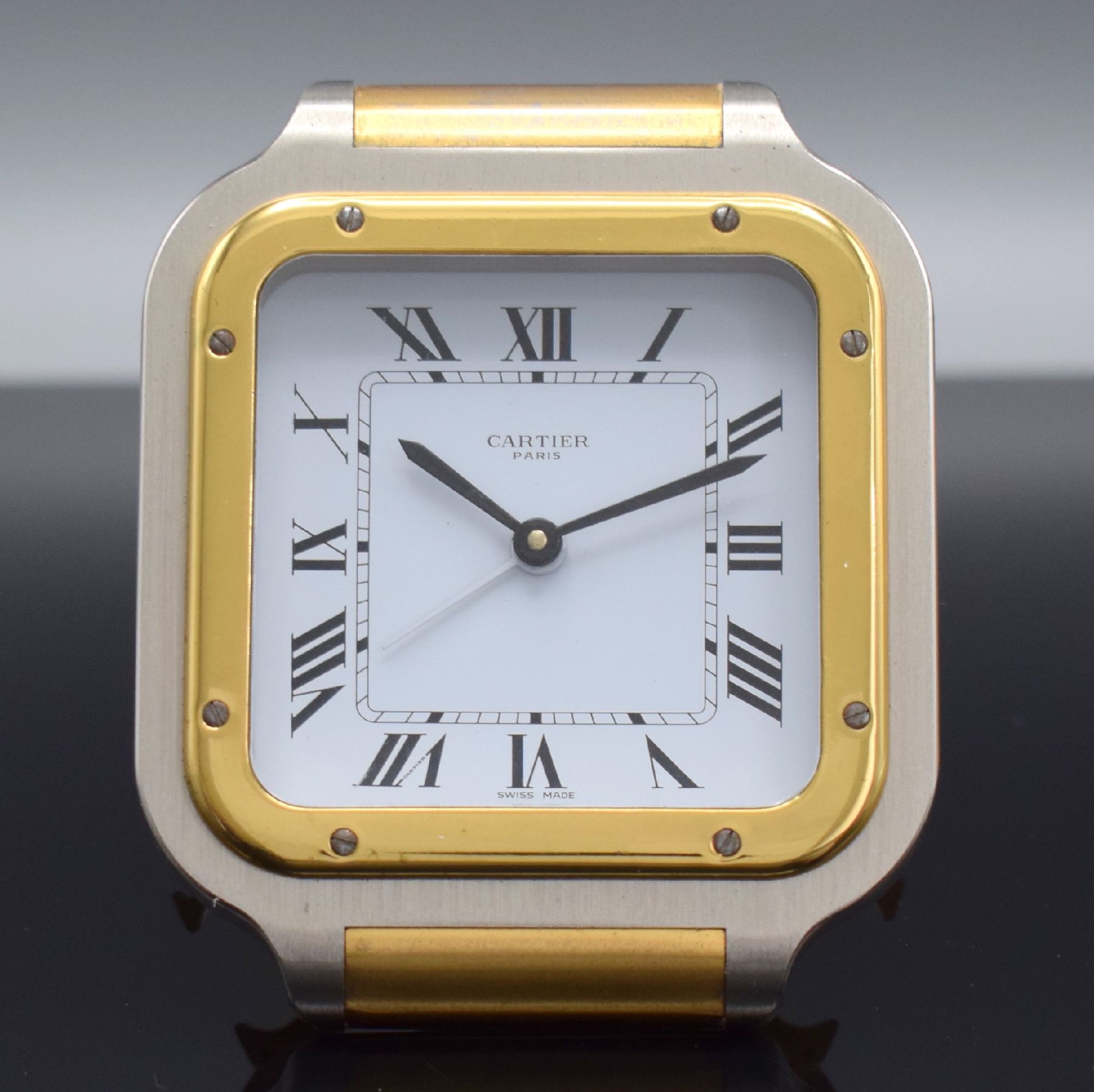 Detail a: CARTIER Paris Tischwecker Modell Santos, Schweiz 1980er Jahre, quarz, Ref. 7508, 2- farb. Messinggeh., emailfarb. Zifferbl. m. röm. Zahlen, M. ca. ...