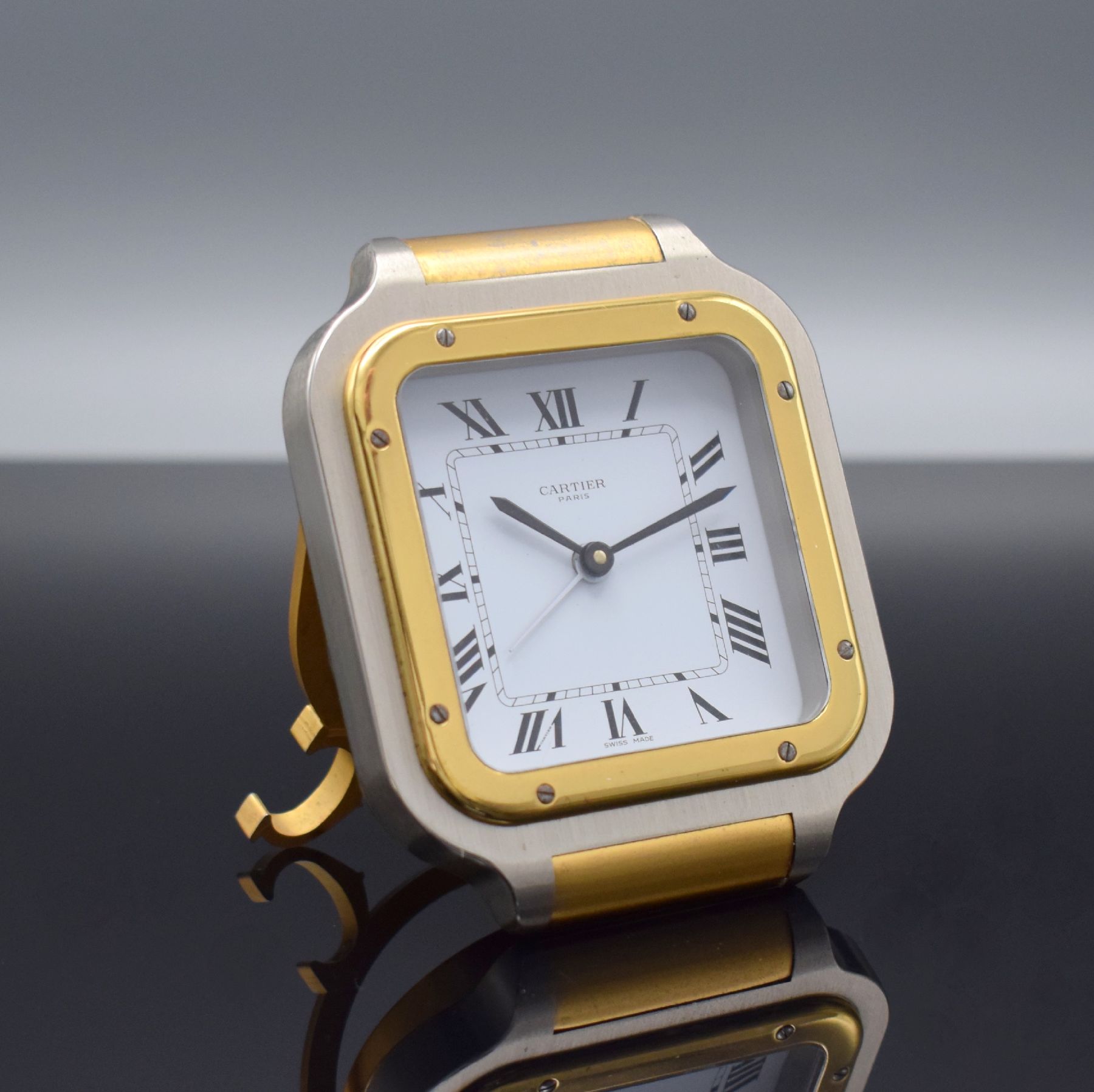 Detail b: CARTIER Paris Tischwecker Modell Santos, Schweiz 1980er Jahre, quarz, Ref. 7508, 2- farb. Messinggeh., emailfarb. Zifferbl. m. röm. Zahlen, M. ca. ...