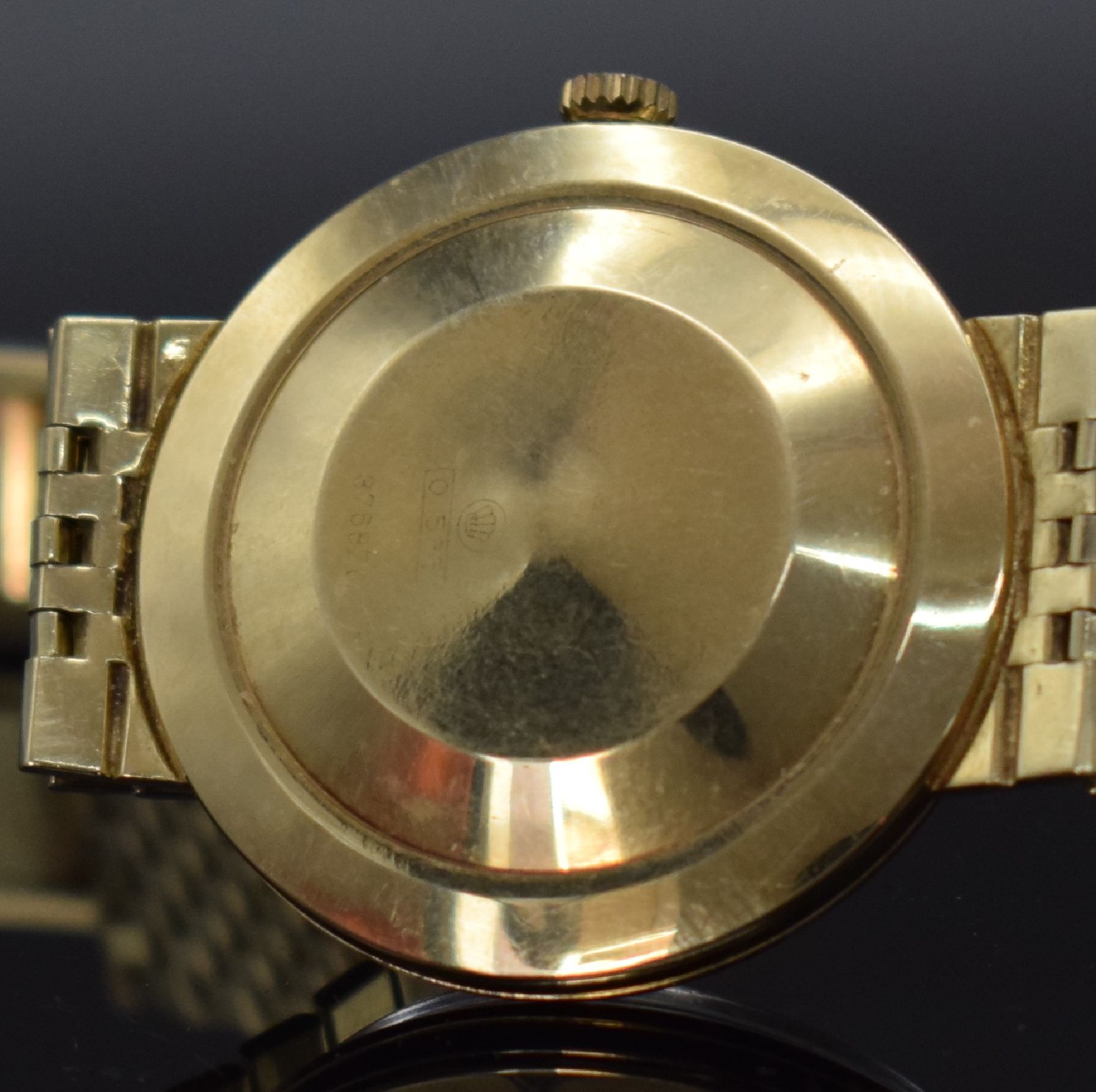 Detail h: HAGO Herrenarmbanduhr in GG 585/000, Deutschland/Schweiz um 1960, Automatik, aufgedr. Boden dell., anges. Goldband, silb. Zifferbl., gold. Zeiger, ...