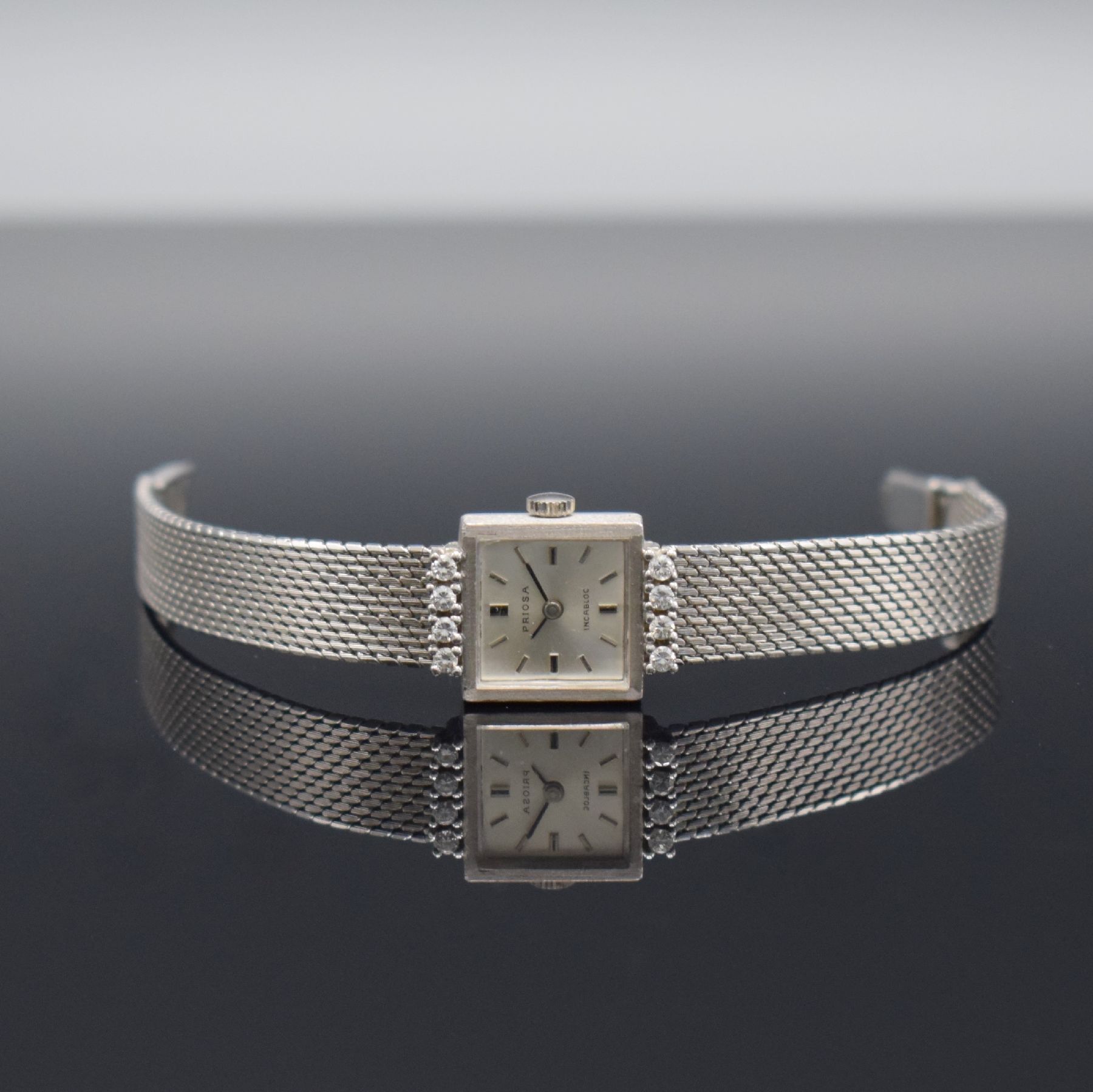 PRIOSA diamantbesetzte Damenarmbanduhr in WG 585/000, Deutschland/Schweiz um 1960, Handaufzug, gedr. Geh. am Bandansatz m. 8 Diamanten bes., silb. ...