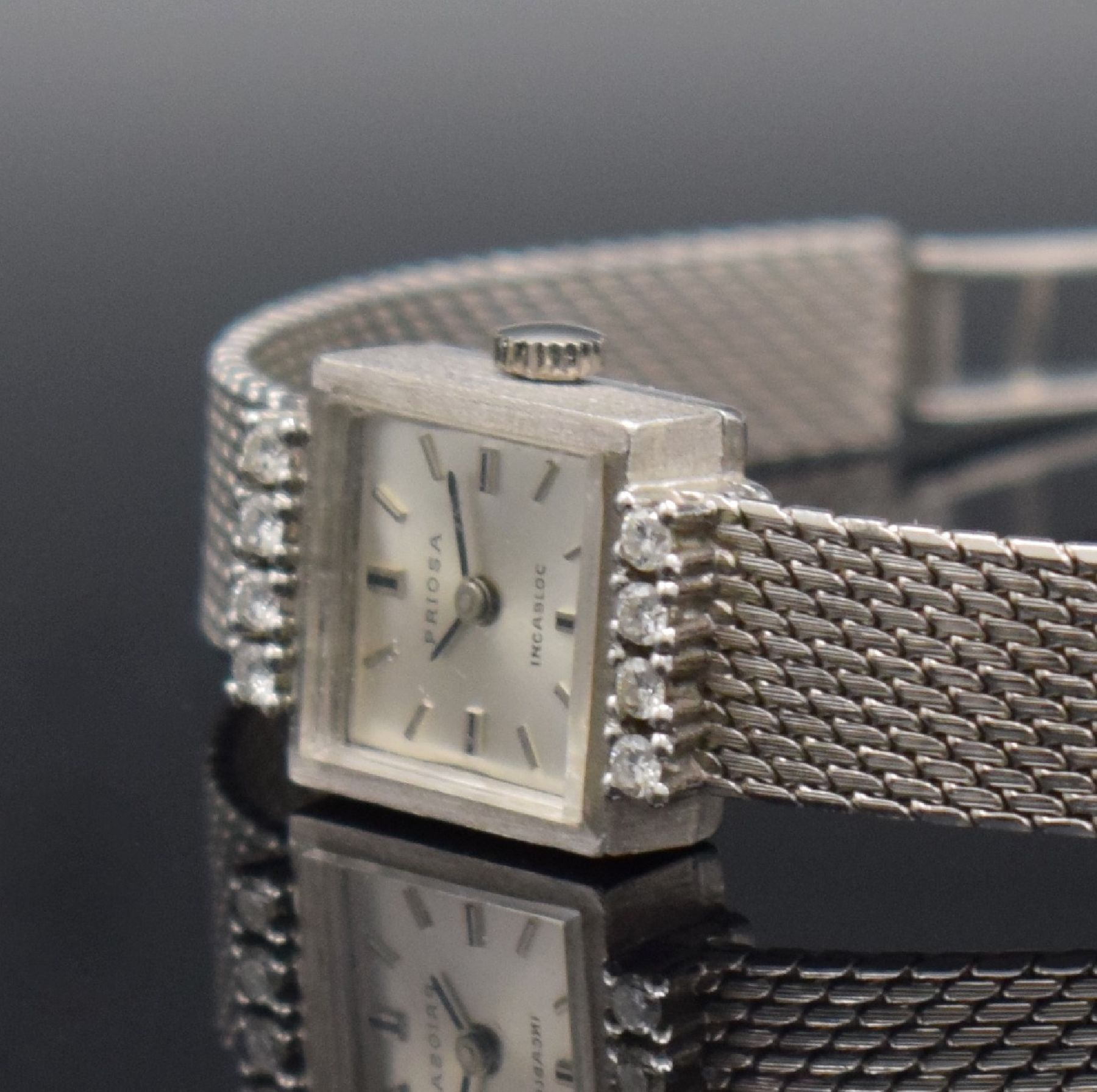Detail b: PRIOSA diamantbesetzte Damenarmbanduhr in WG 585/000, Deutschland/Schweiz um 1960, Handaufzug, gedr. Geh. am Bandansatz m. 8 Diamanten bes., silb. ...