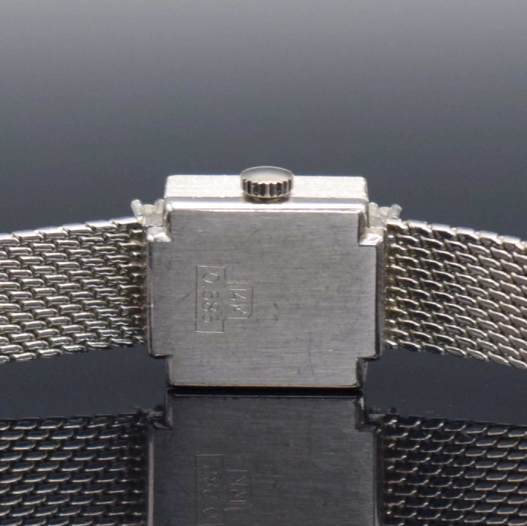 Detail e: PRIOSA diamantbesetzte Damenarmbanduhr in WG 585/000, Deutschland/Schweiz um 1960, Handaufzug, gedr. Geh. am Bandansatz m. 8 Diamanten bes., silb. ...