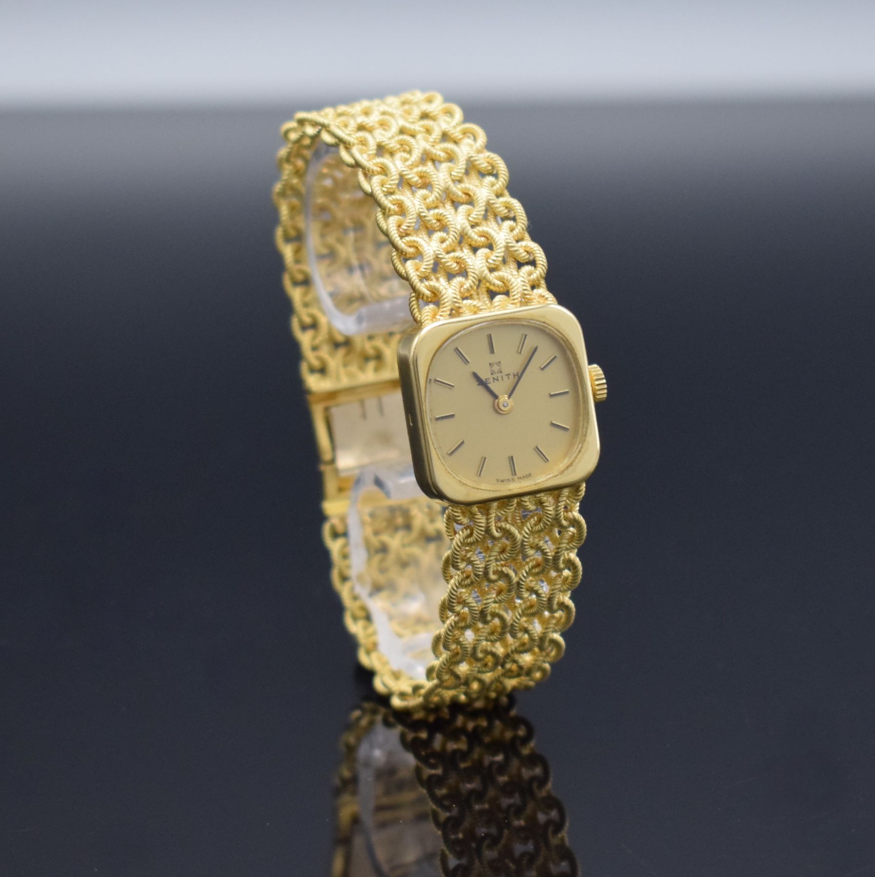 Detail d: ZENITH Damengoldbanduhr in GG 750/000, Schweiz um 1980, Handaufzug, quadrat. Geh., Boden aufgedr., aufw., anges. Band aus grav. Ösen, gold. ...