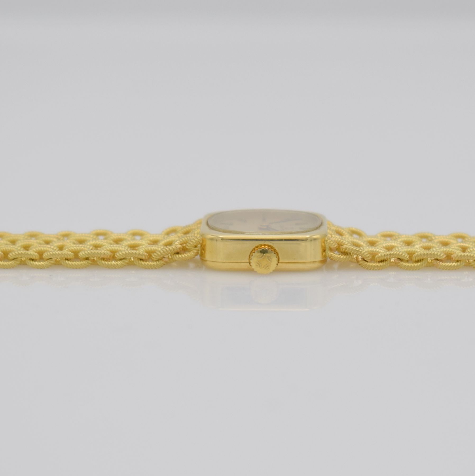 Detail i: ZENITH Damengoldbanduhr in GG 750/000, Schweiz um 1980, Handaufzug, quadrat. Geh., Boden aufgedr., aufw., anges. Band aus grav. Ösen, gold. ...