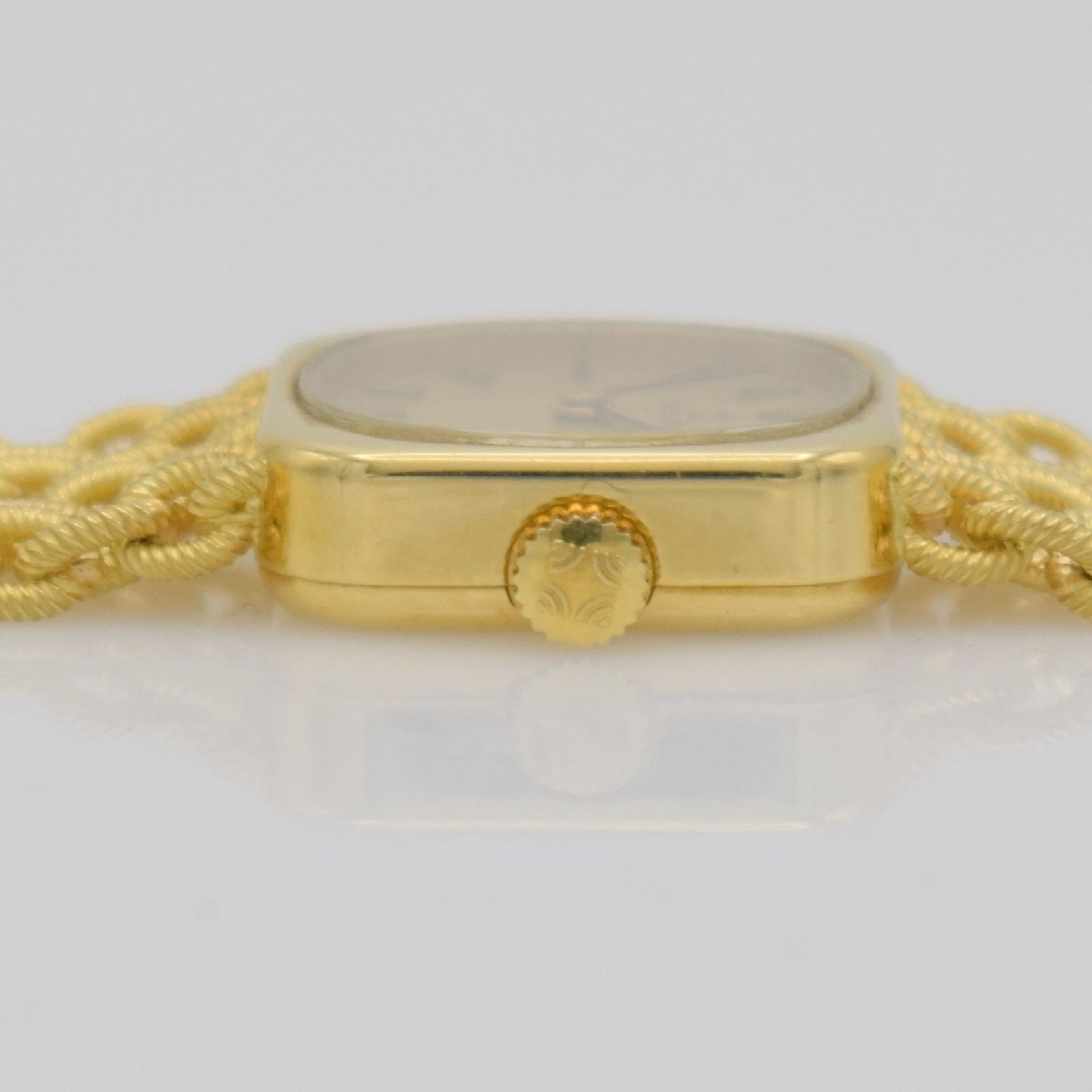 Detail j: ZENITH Damengoldbanduhr in GG 750/000, Schweiz um 1980, Handaufzug, quadrat. Geh., Boden aufgedr., aufw., anges. Band aus grav. Ösen, gold. ...