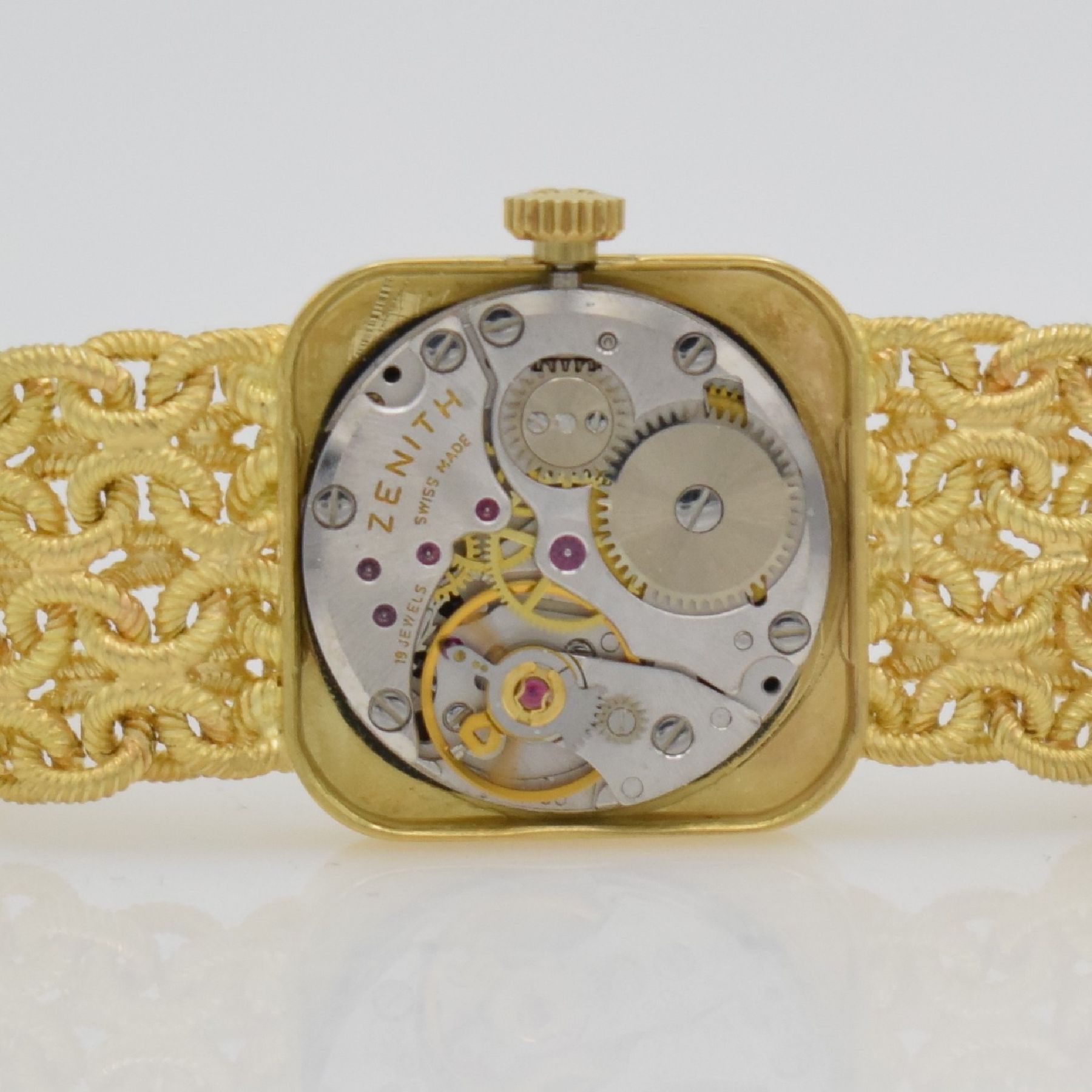 Detail m: ZENITH Damengoldbanduhr in GG 750/000, Schweiz um 1980, Handaufzug, quadrat. Geh., Boden aufgedr., aufw., anges. Band aus grav. Ösen, gold. ...