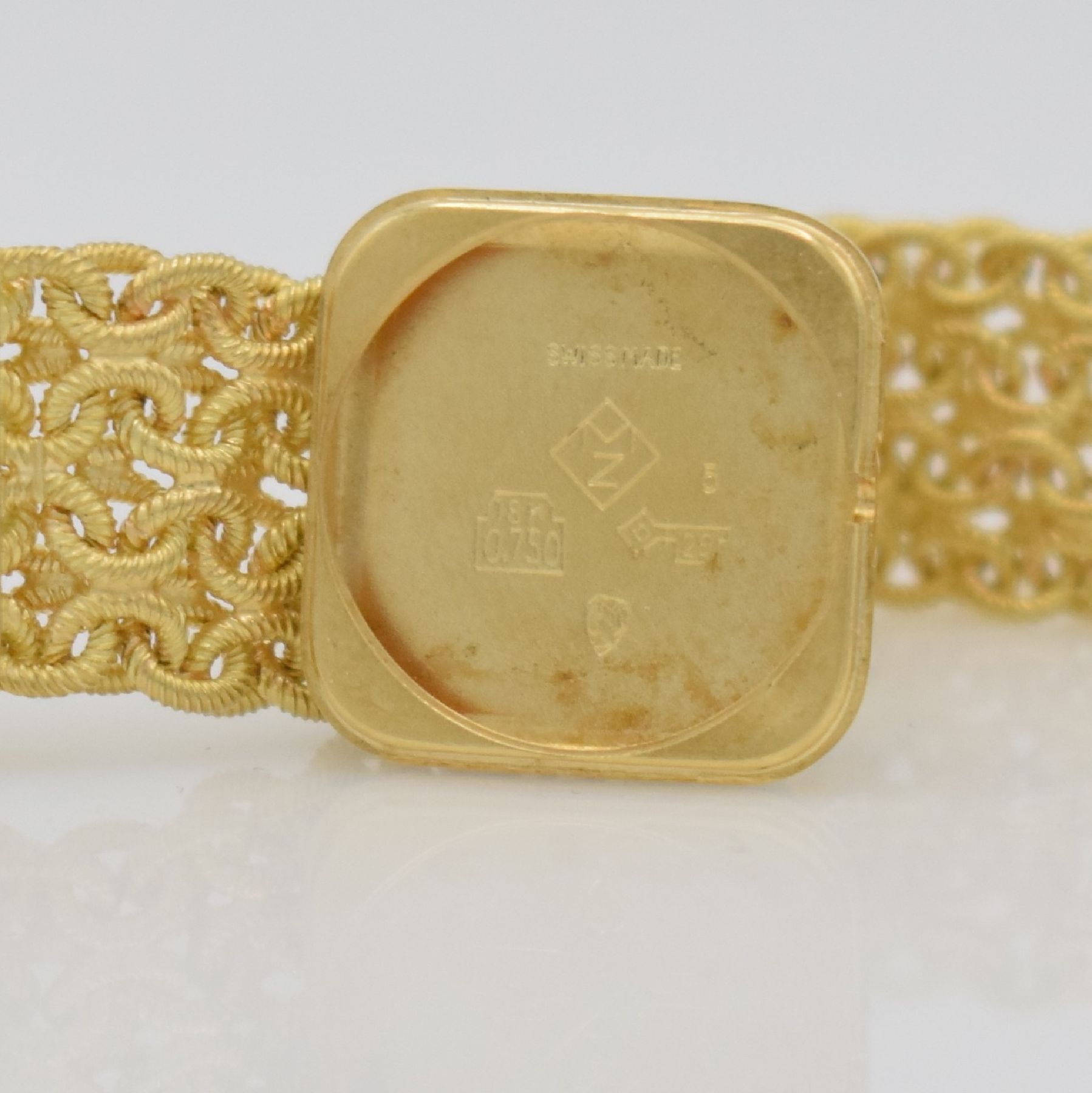 Detail n: ZENITH Damengoldbanduhr in GG 750/000, Schweiz um 1980, Handaufzug, quadrat. Geh., Boden aufgedr., aufw., anges. Band aus grav. Ösen, gold. ...