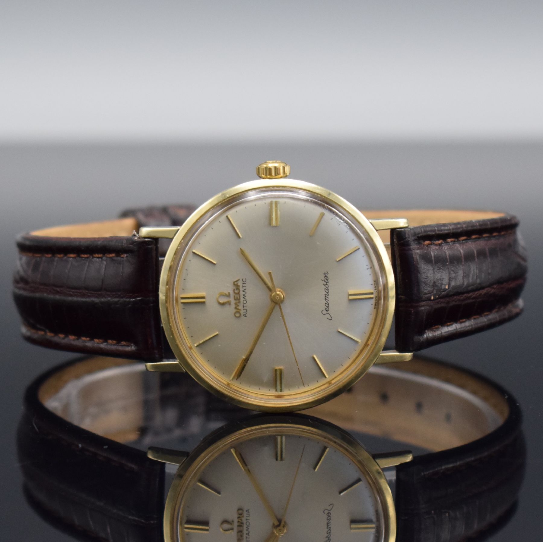 OMEGA Herrenarmbanduhr Seamaster Referenz 14765 61 SC, Automatik, Schweiz um 1961, Monocoque-Geh. m. Goldhaube, get. A-Welle, silb. Zifferbl. m. ...