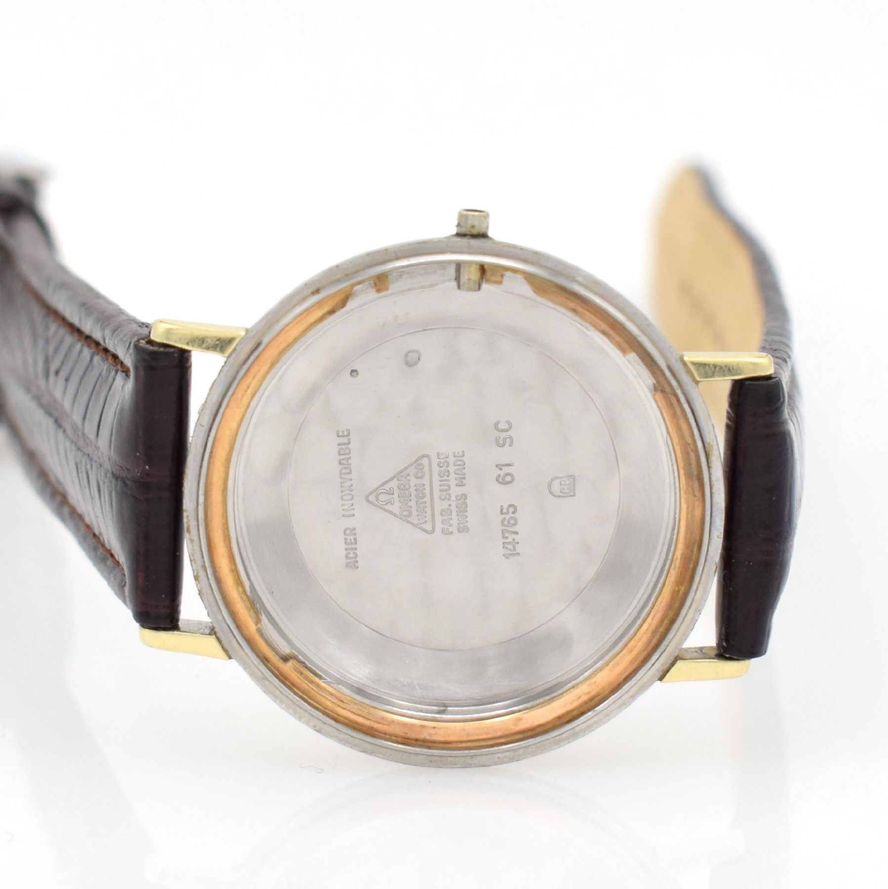 Detail h: OMEGA Herrenarmbanduhr Seamaster Referenz 14765 61 SC, Automatik, Schweiz um 1961, Monocoque-Geh. m. Goldhaube, get. A-Welle, silb. Zifferbl. m. ...
