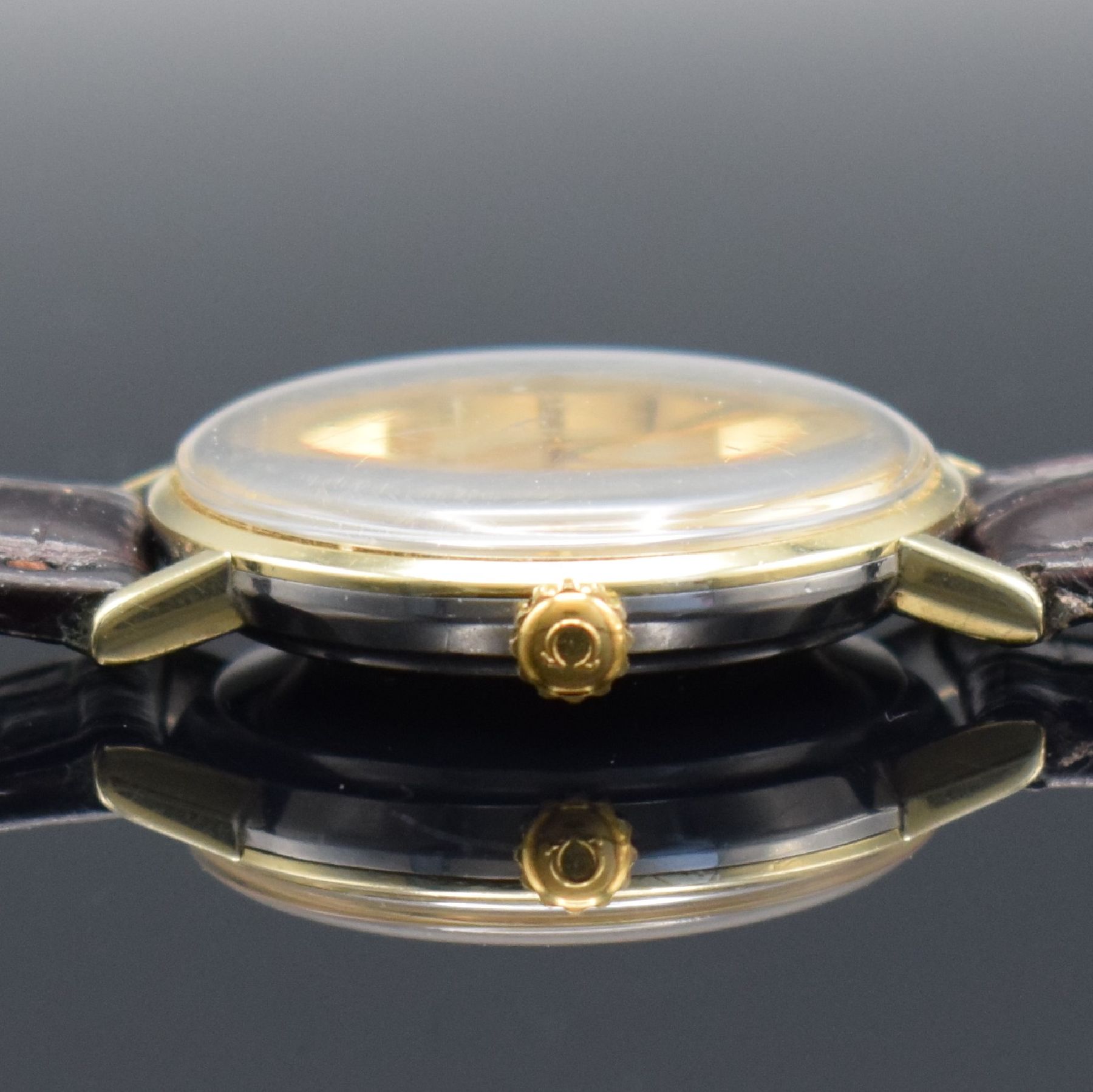 Detail j: OMEGA Herrenarmbanduhr Seamaster Referenz 14765 61 SC, Automatik, Schweiz um 1961, Monocoque-Geh. m. Goldhaube, get. A-Welle, silb. Zifferbl. m. ...