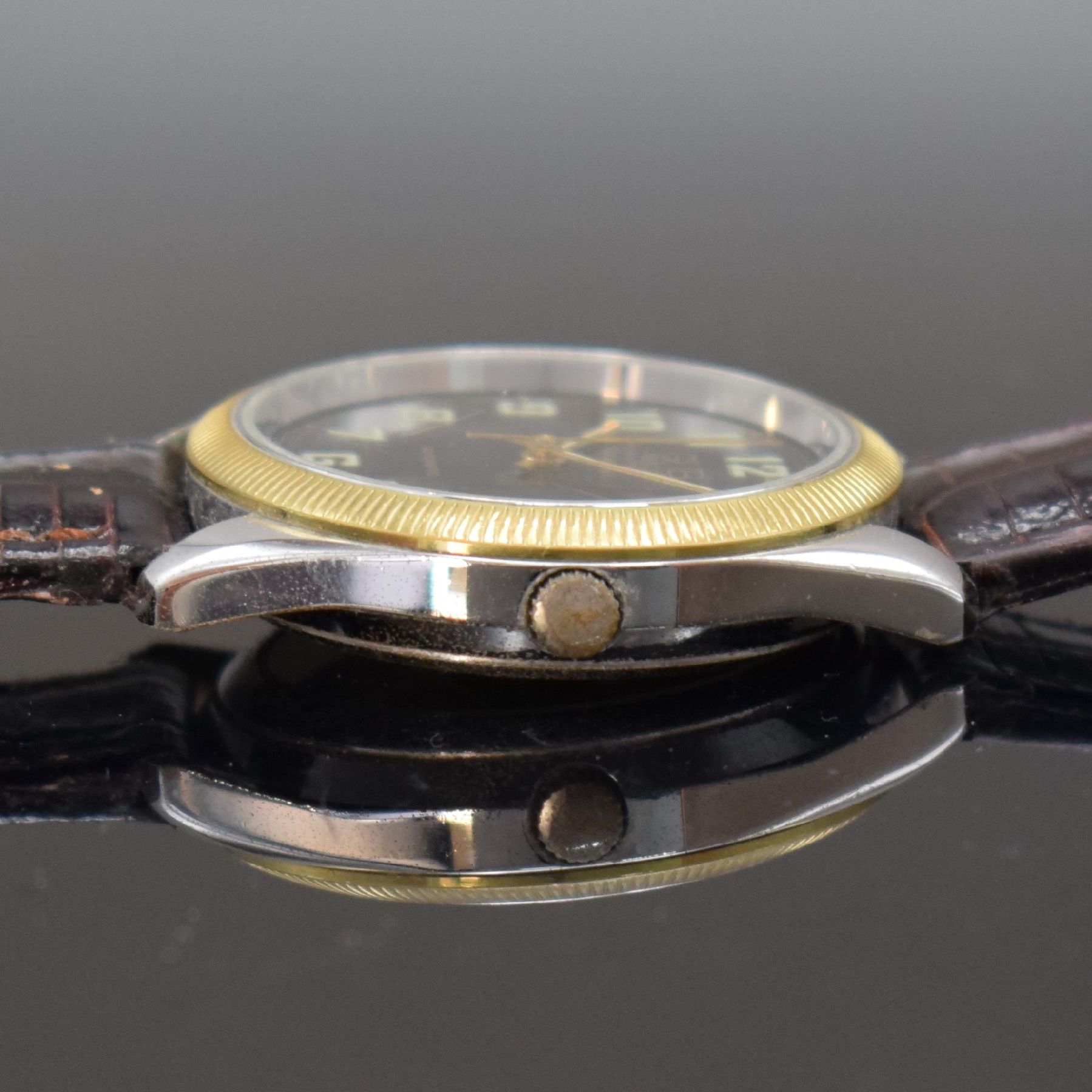 Detail c: GUB Herrenarmbanduhr, Deutschland/Schweiz um 1993, Automatik, verchr. Metallgeh. beids. vergl., Verchromung teilw. besch., geriffelte Lünette verg., ...
