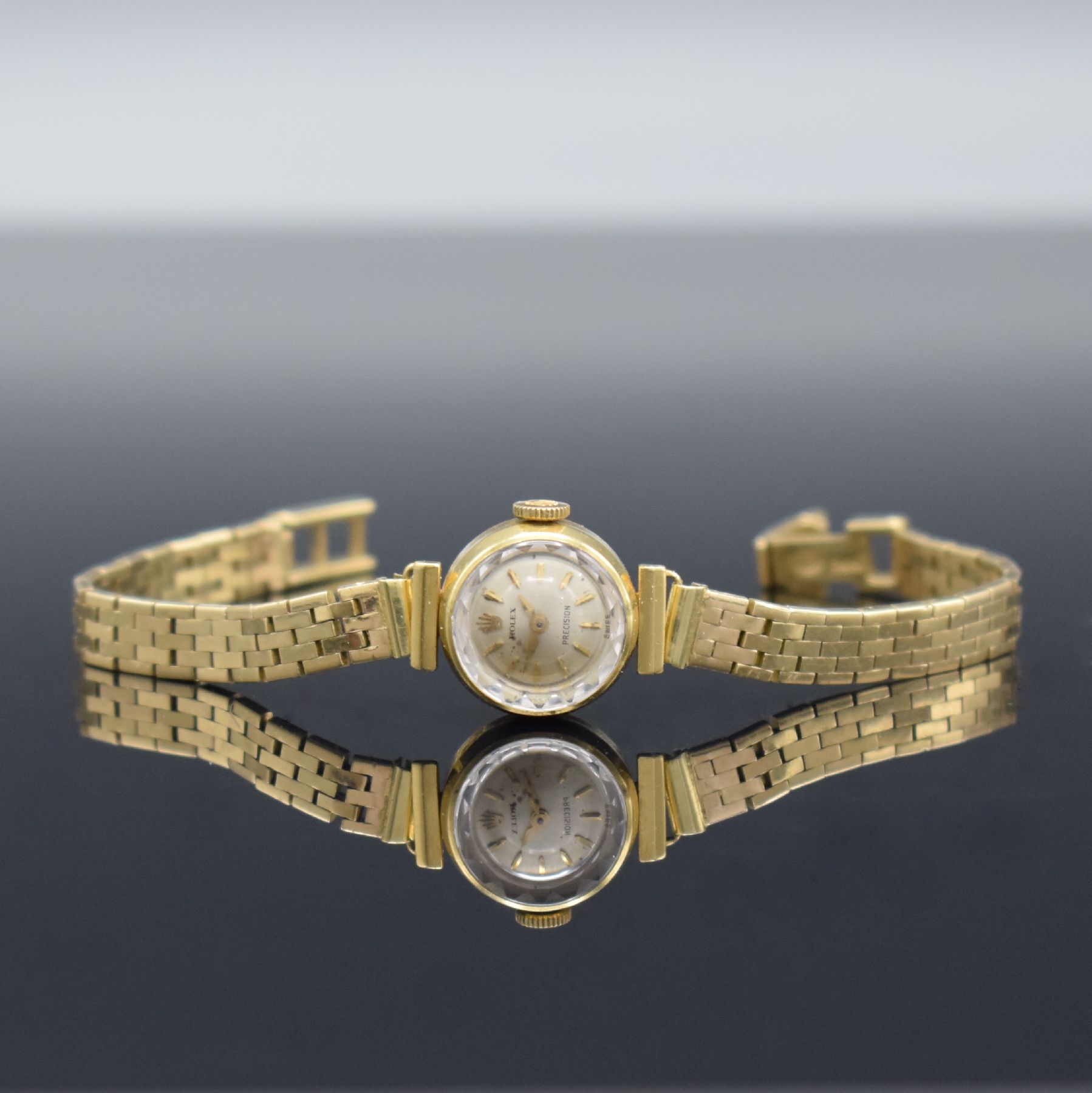 ROLEX Precision Damenarmbanduhr in GG 750/000, Schweiz um 1960, Handaufzug, Boden aufgedr., neutr. Band in GG 585/000 auf Kundenwunsch später, silb. ...