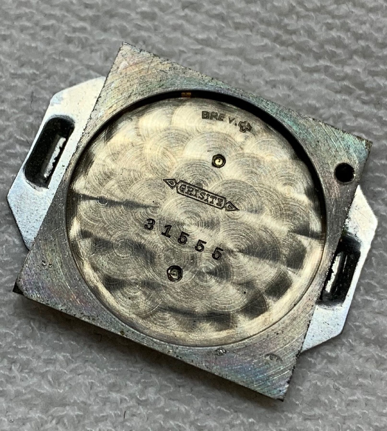 Detail h: MOVADO Ermeto seltenes Reiseührchen mit Vollkalender & Mondphase, Schweiz um 1940, Handaufzug, Nickel-Geh. m. Lederbezug, beids. aufschiebbar, ...