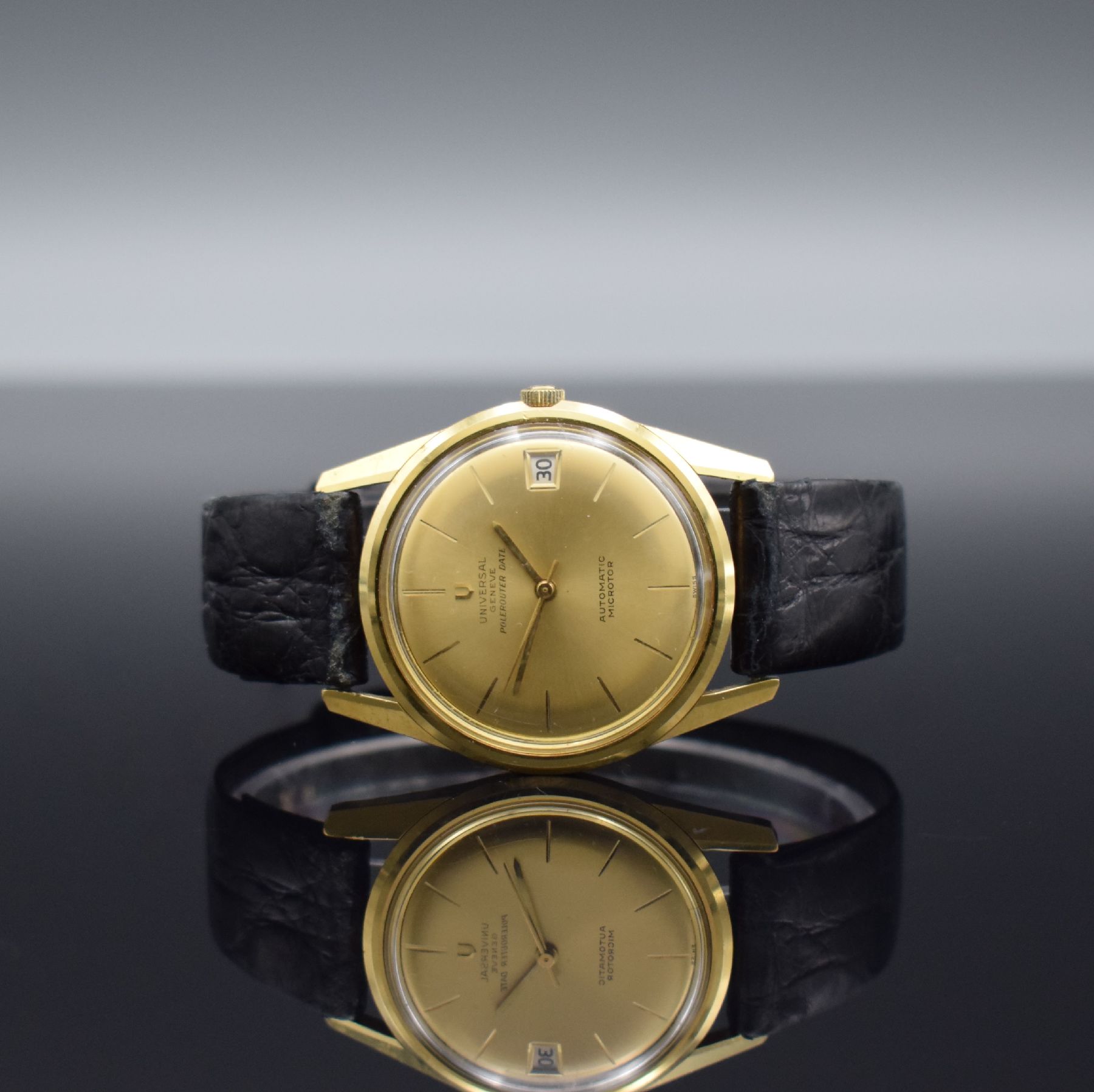 UNIVERSAL GENEVE Polrouter Date Herrenarmbanduhr in GG 750/000 mit Kal. 215-2, Schweiz um 1965, Automatik, verschr. Geh. Ref. 104602/1, gold. ...